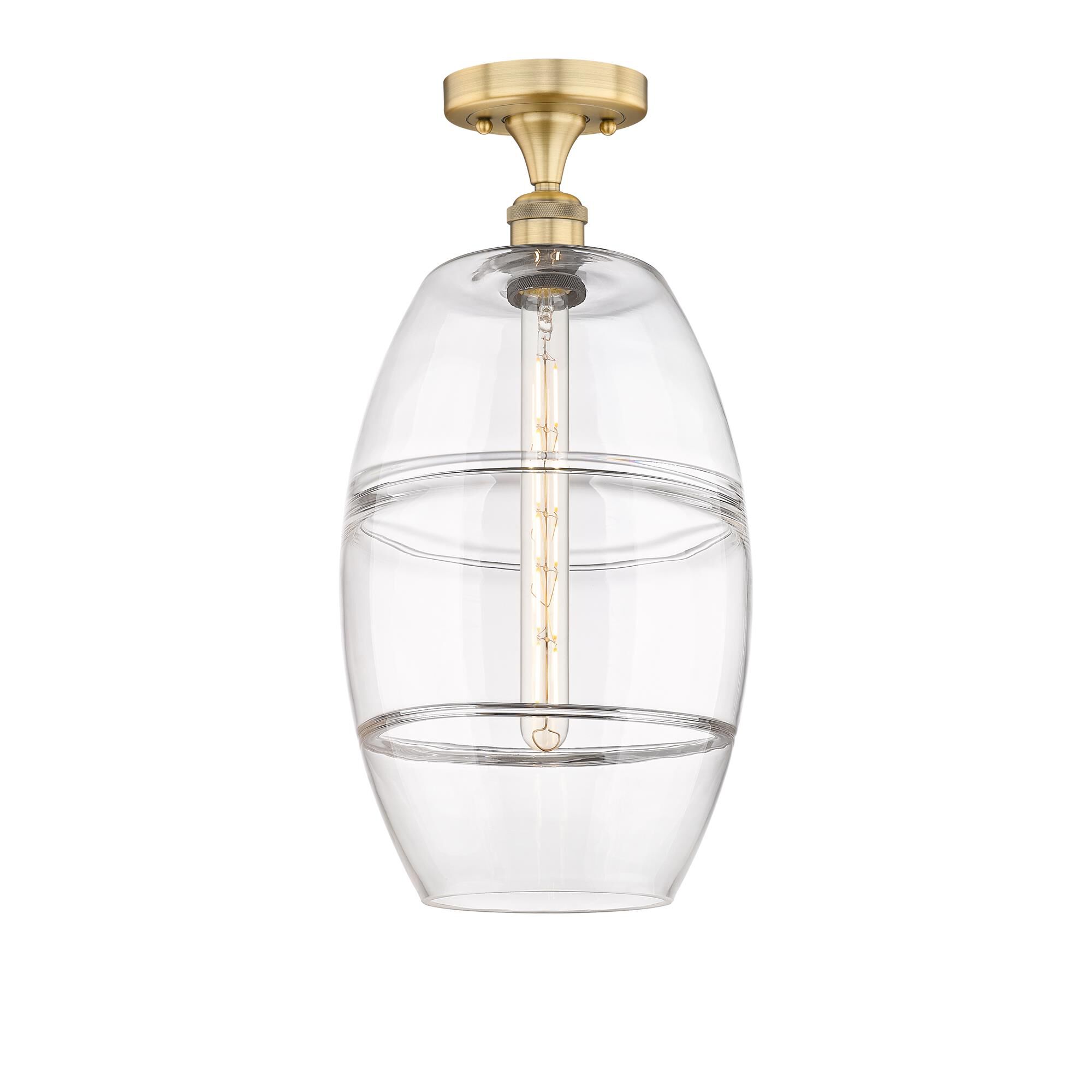 Shown in Brushed Brass finish and Clear glass