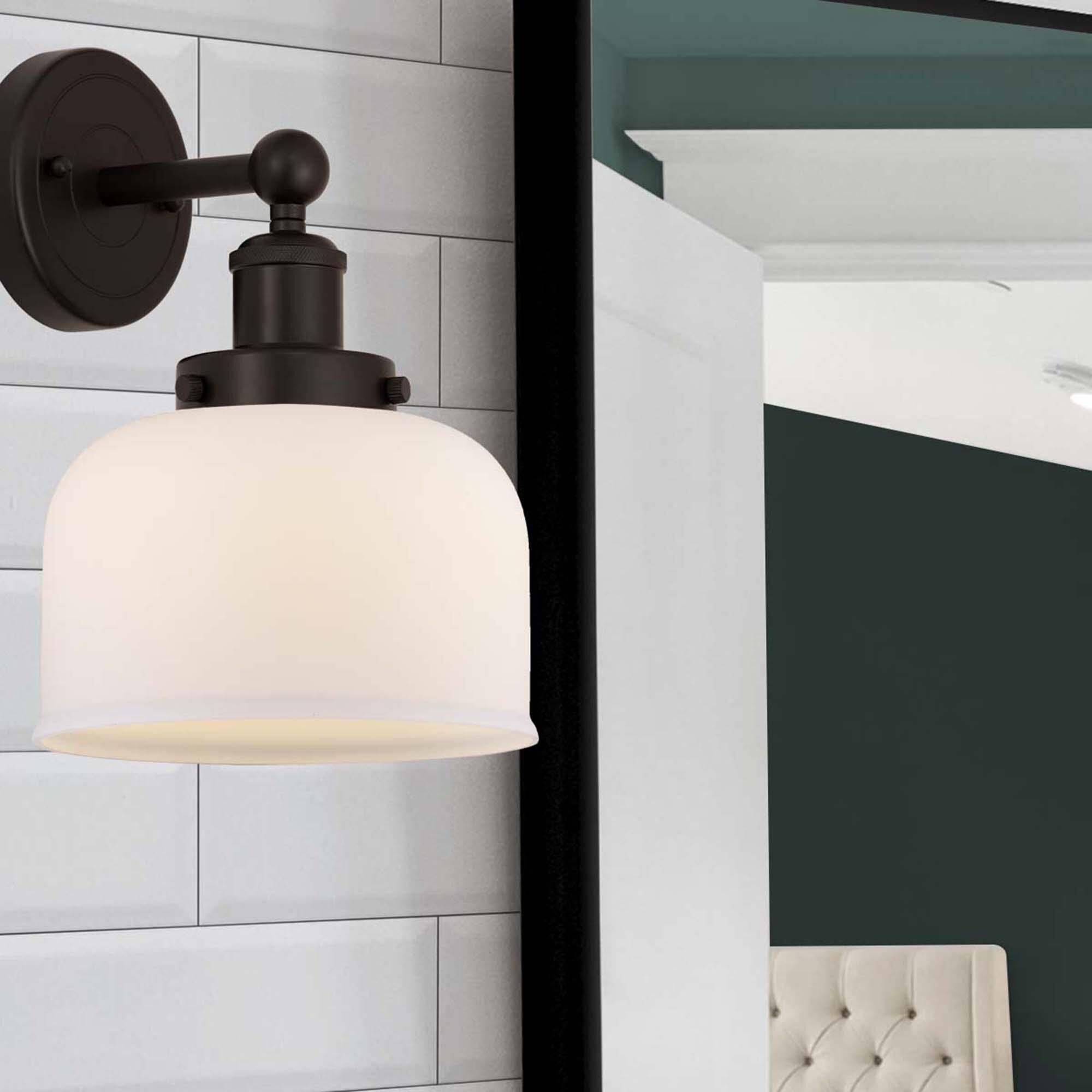 Shown in Oil Rubbed Bronze  finish and Matte White glass