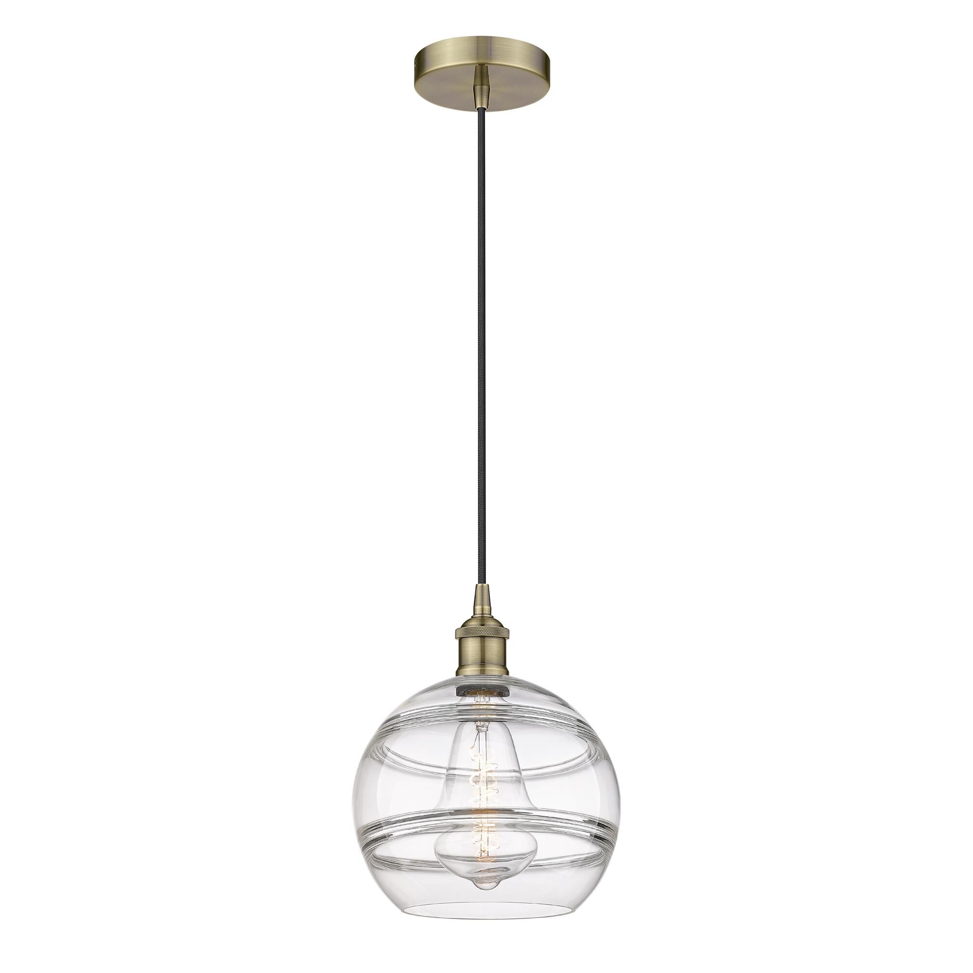 Shown in Antique Brass finish and Clear glass