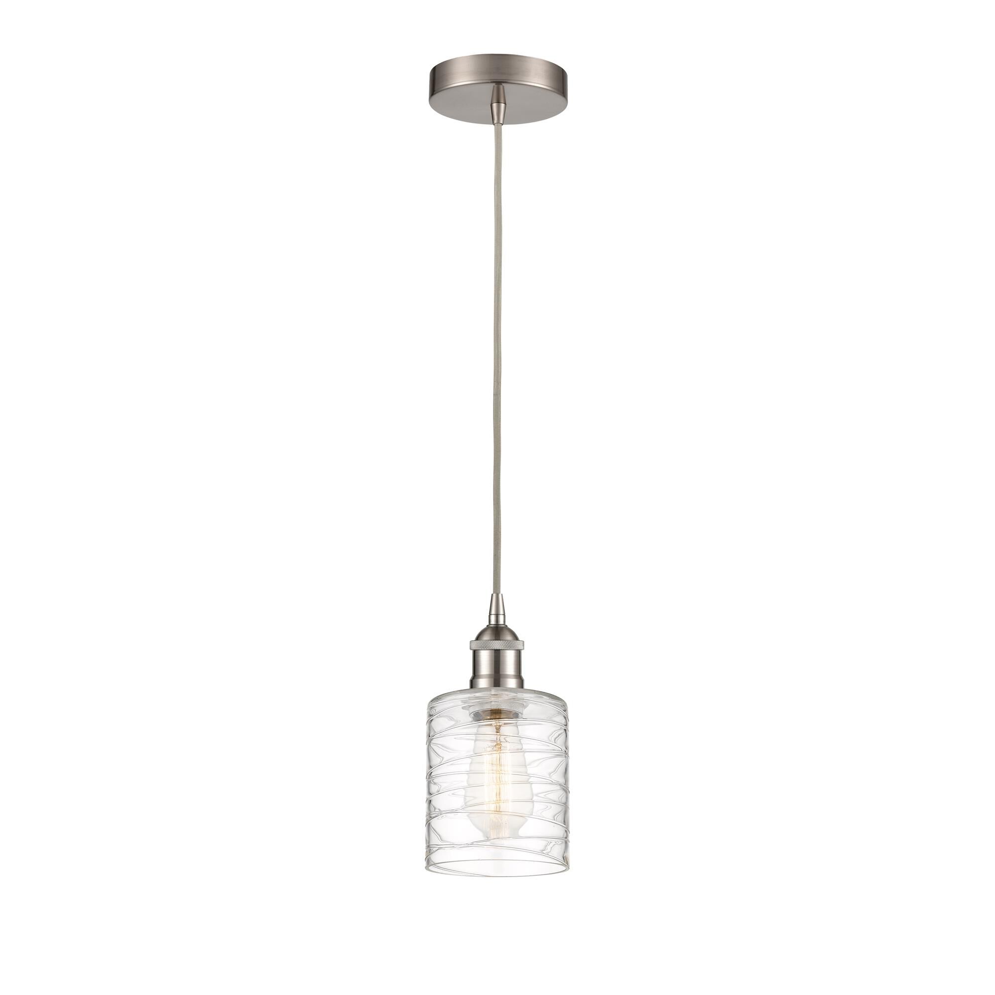 Shown in Brushed Satin Nickel finish and Deco Swirl glass