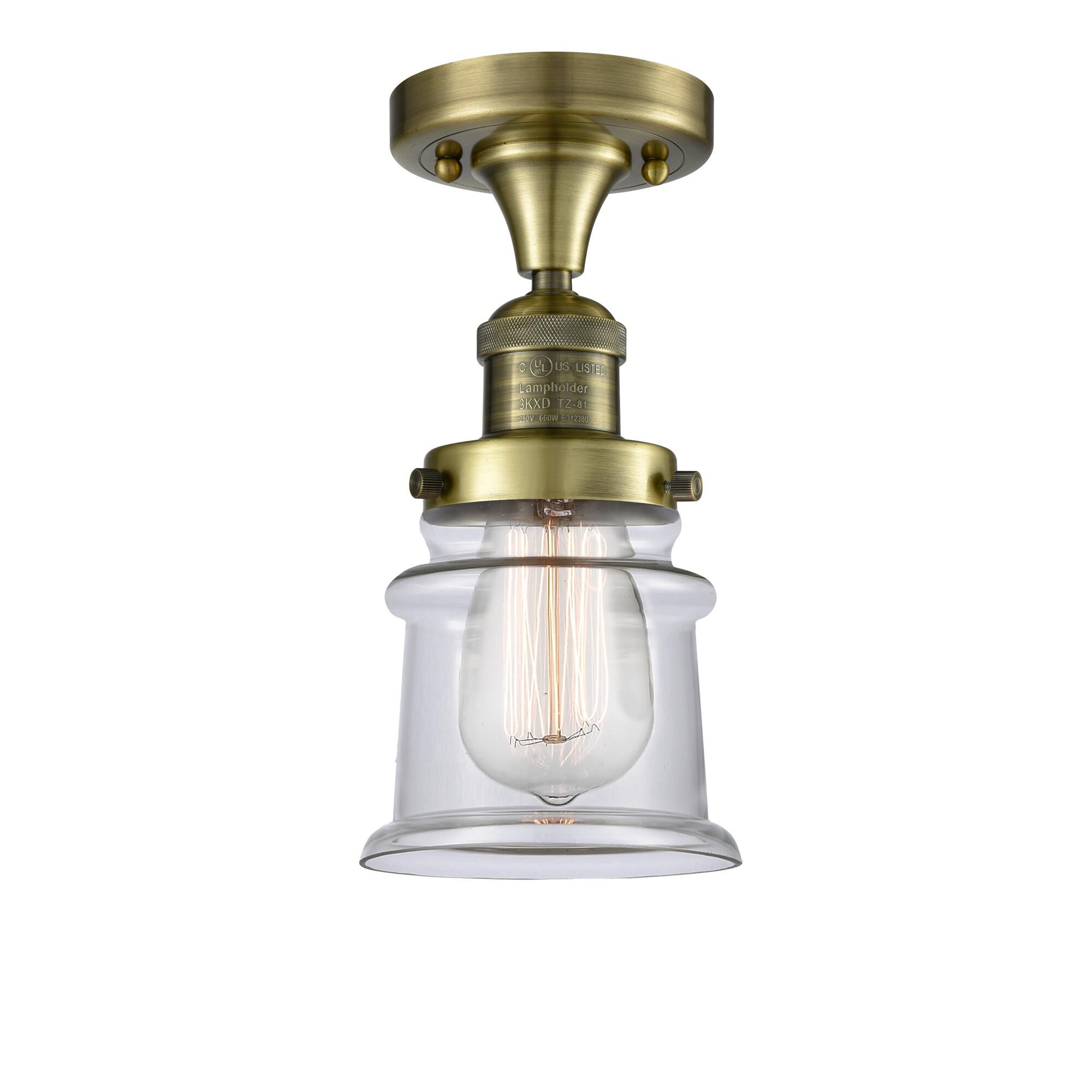 Shown in Antique Brass finish and Clear glass