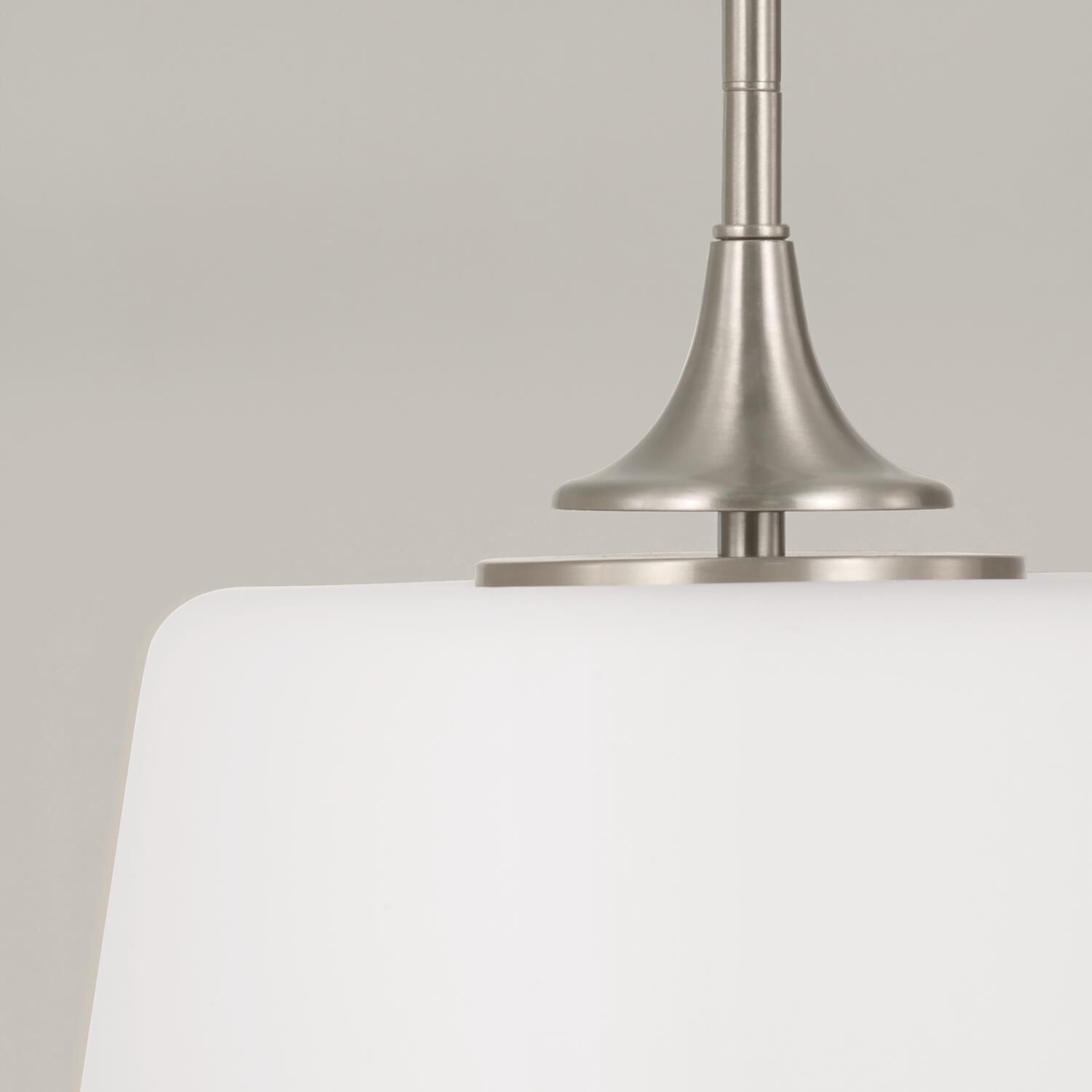 Shown in Brushed and Satin Nickel finish and Soft White glass