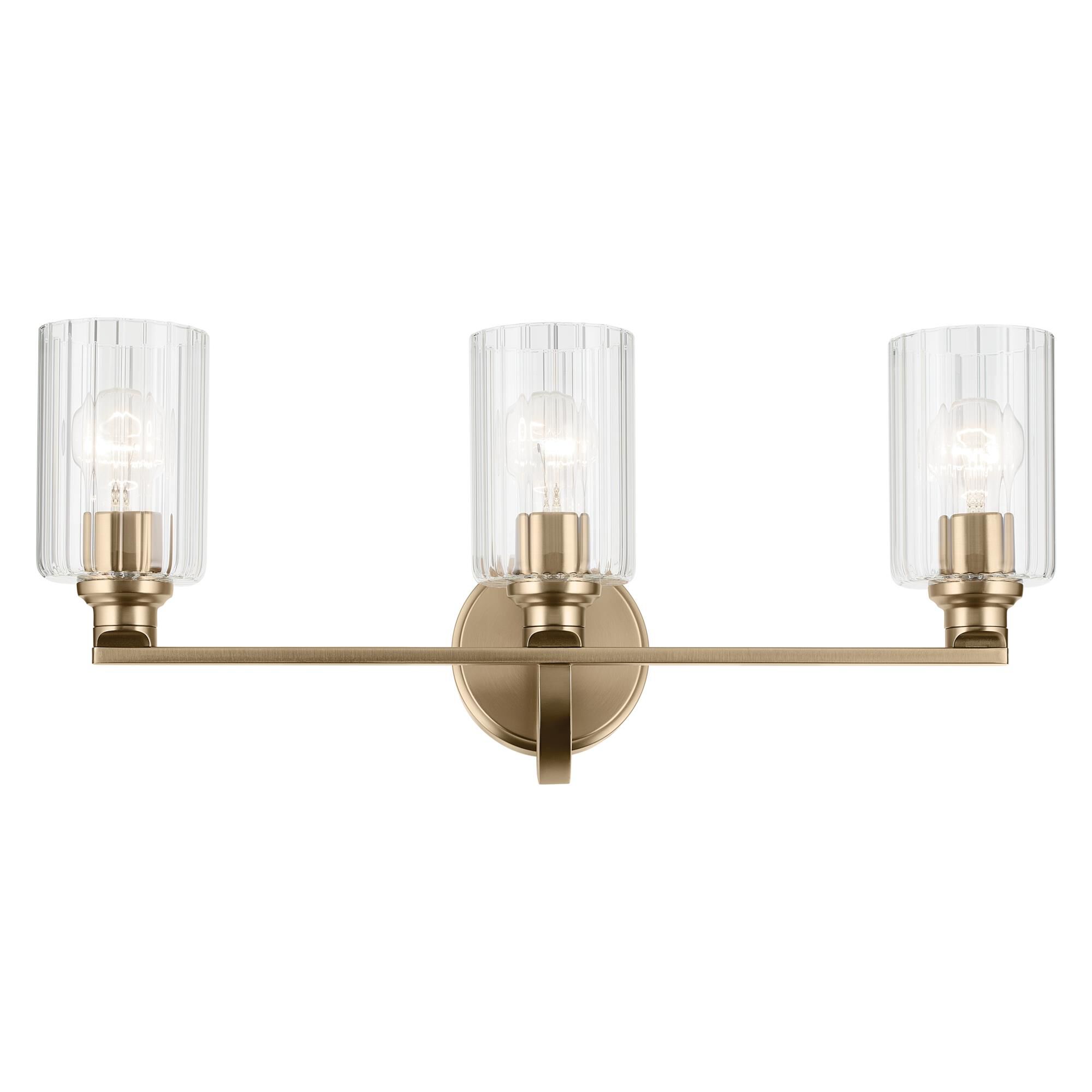 Shown in Champagne Bronze finish and Clear Fluted glass