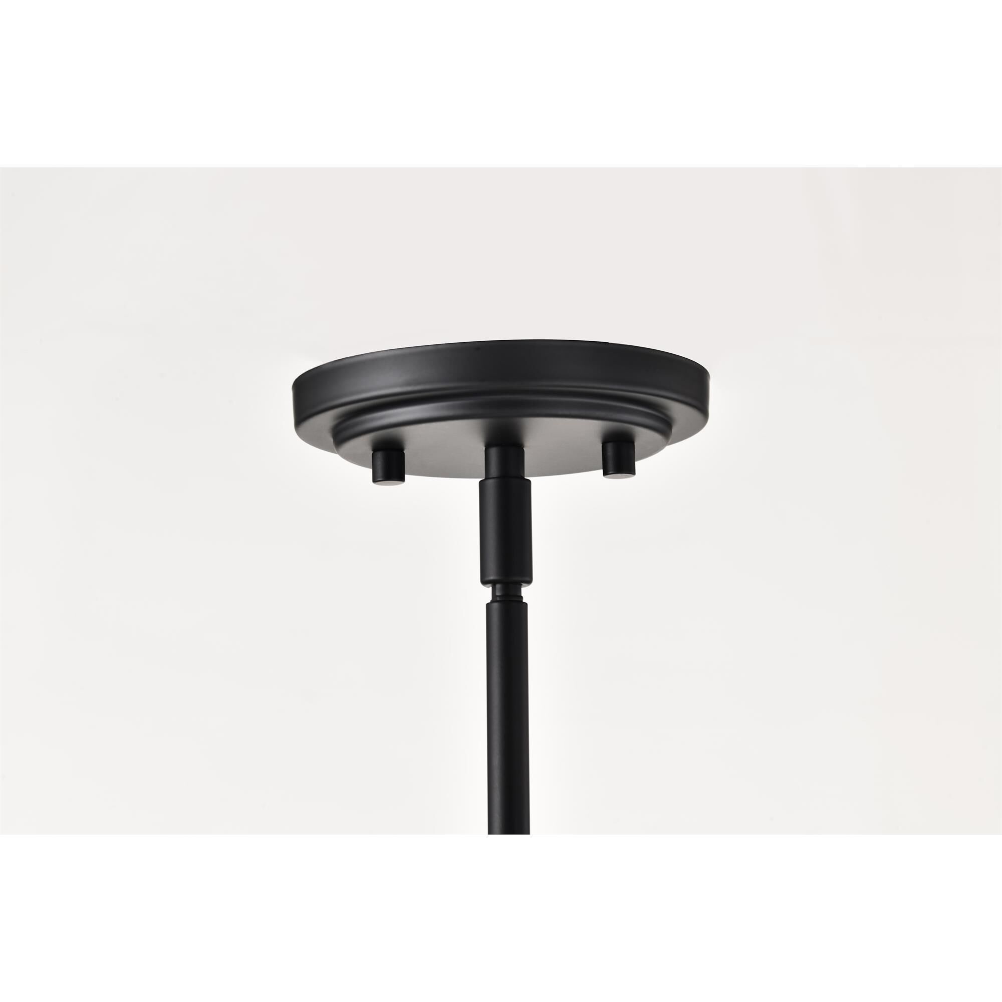 Shown in Matte Black finish and Frosted Ribbed glass