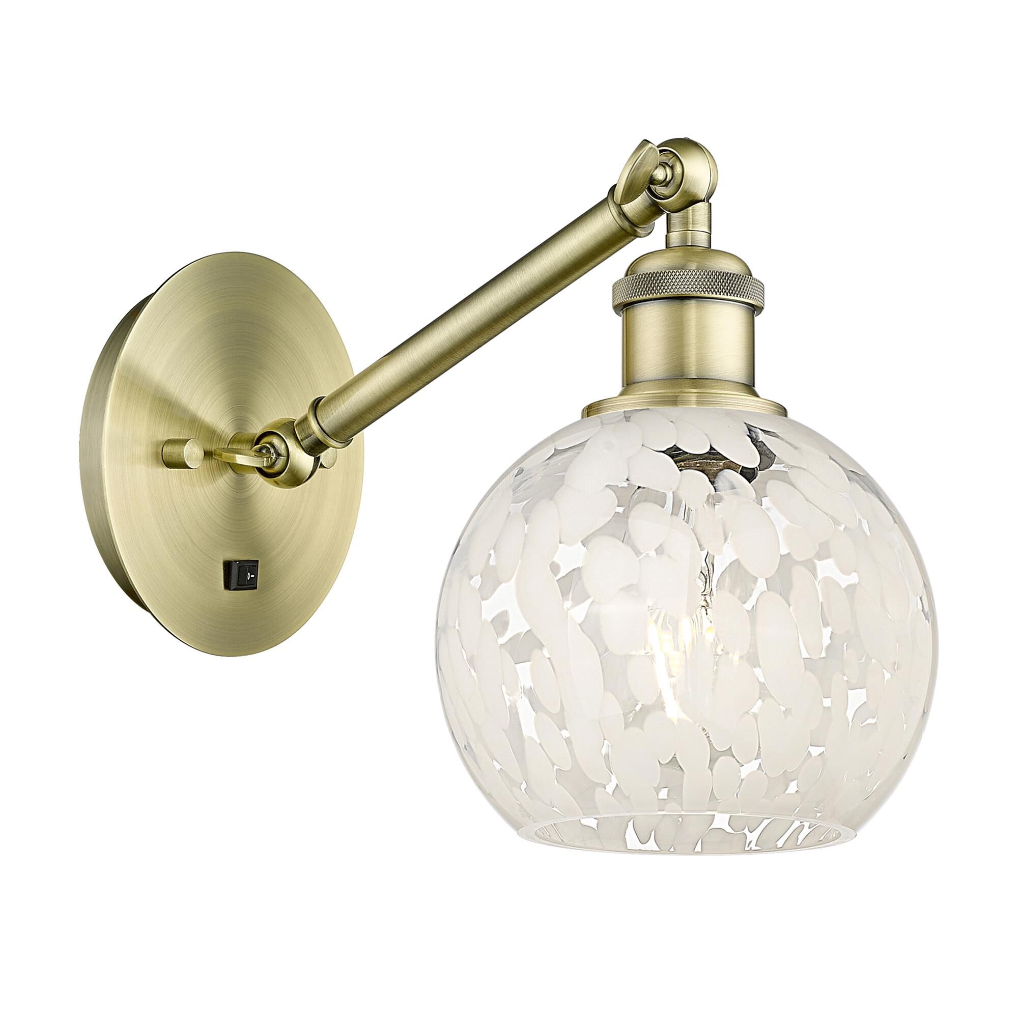 Shown in Antique Brass finish and White Mouchette glass