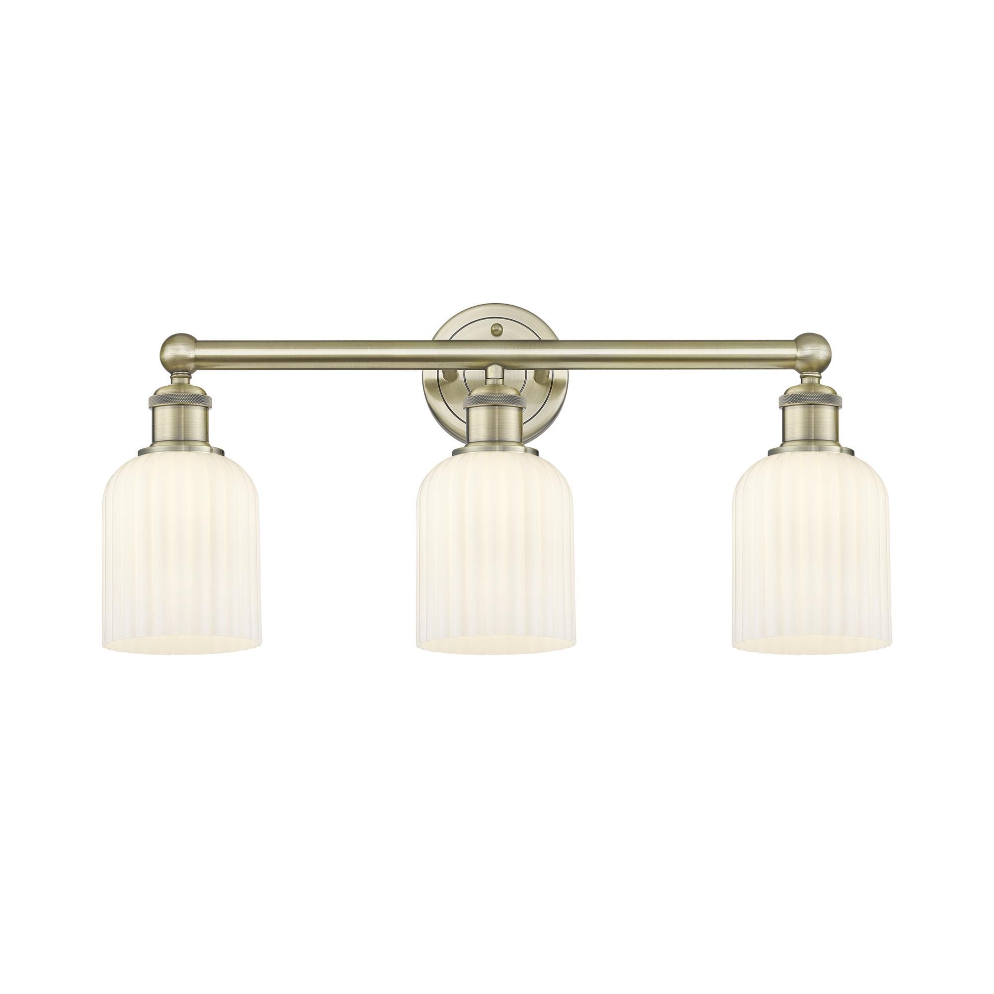 Shown in Antique Brass finish and Gloss White glass