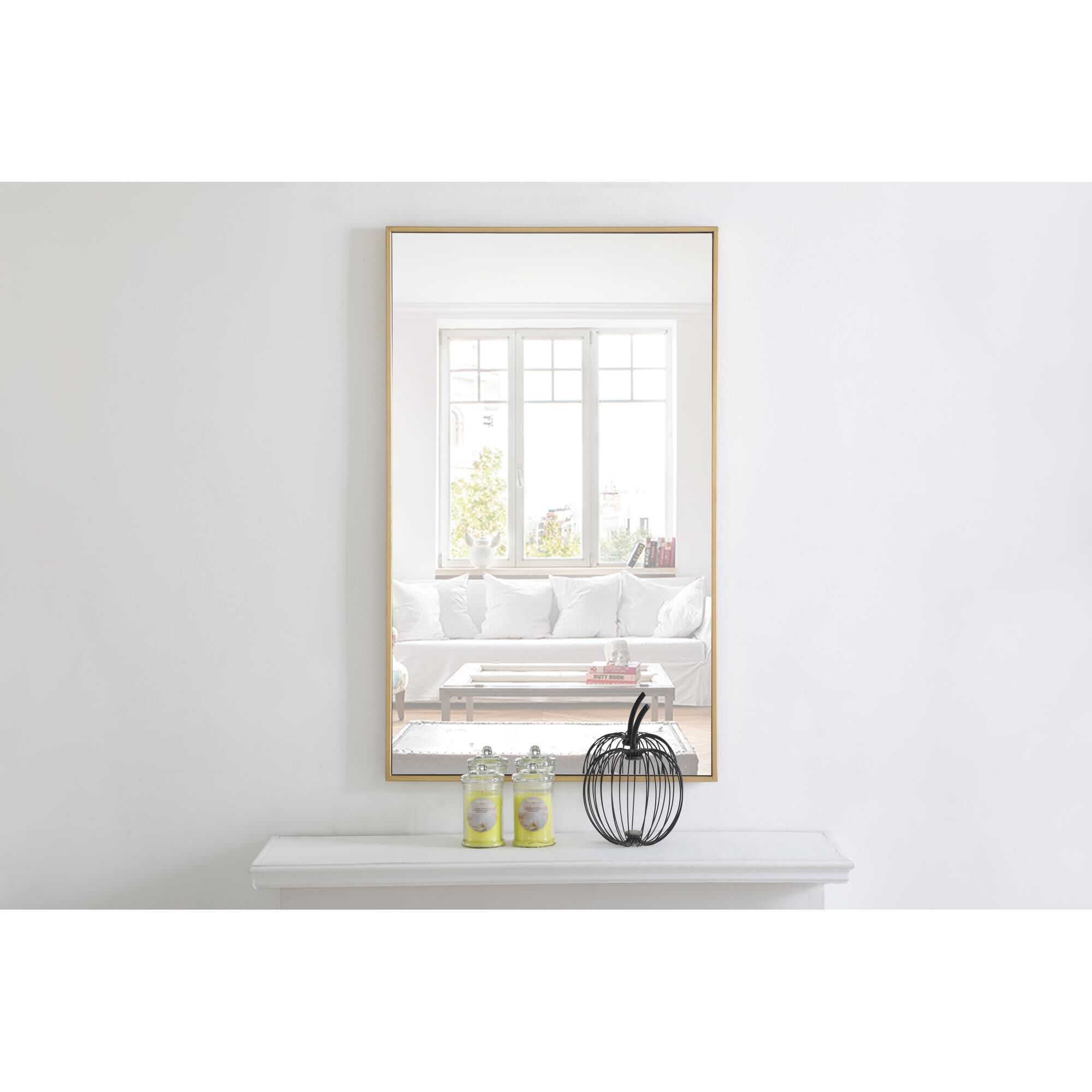 Shown in Brass finish and Clear Mirror Beveled glass
