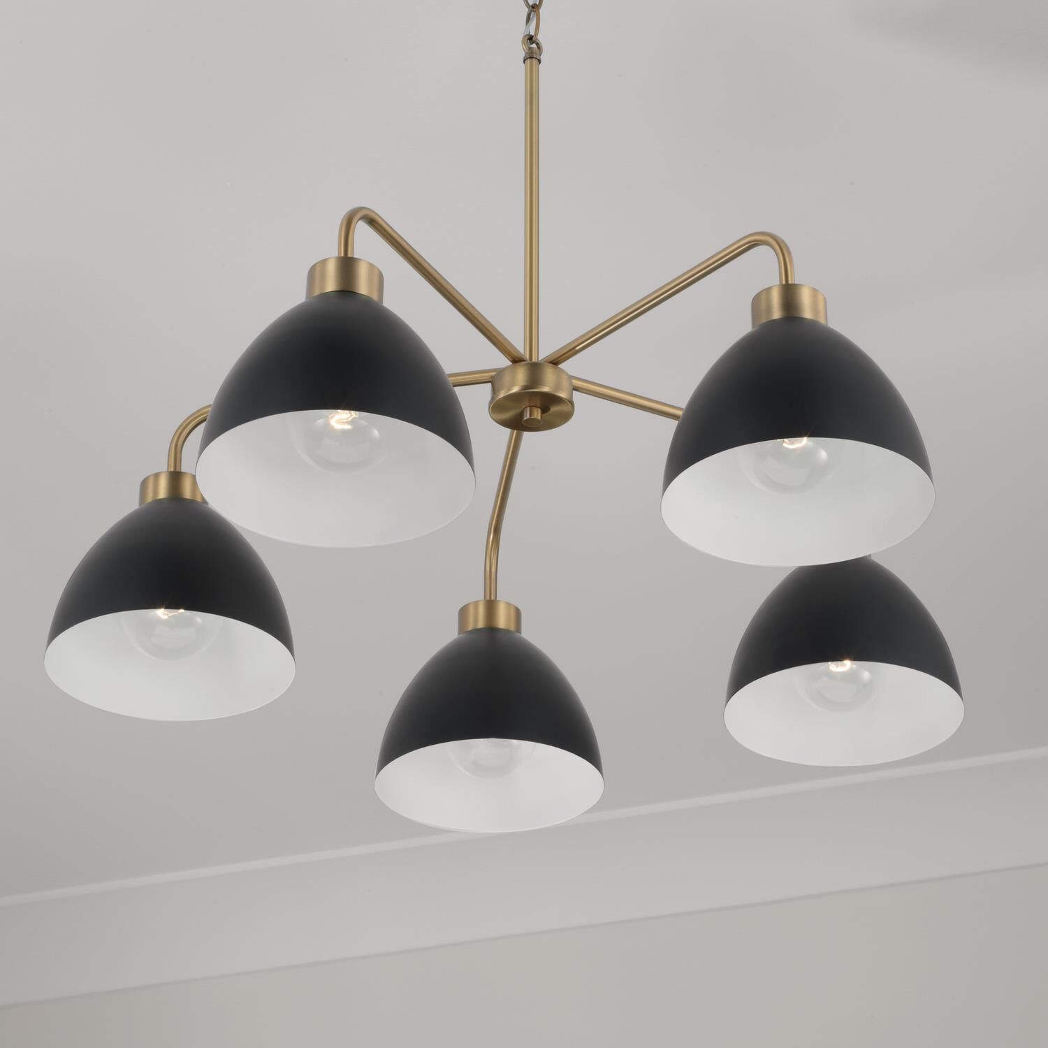Shown in Aged Brass And Black finish and Matte Black Metal  With White Interior shade
