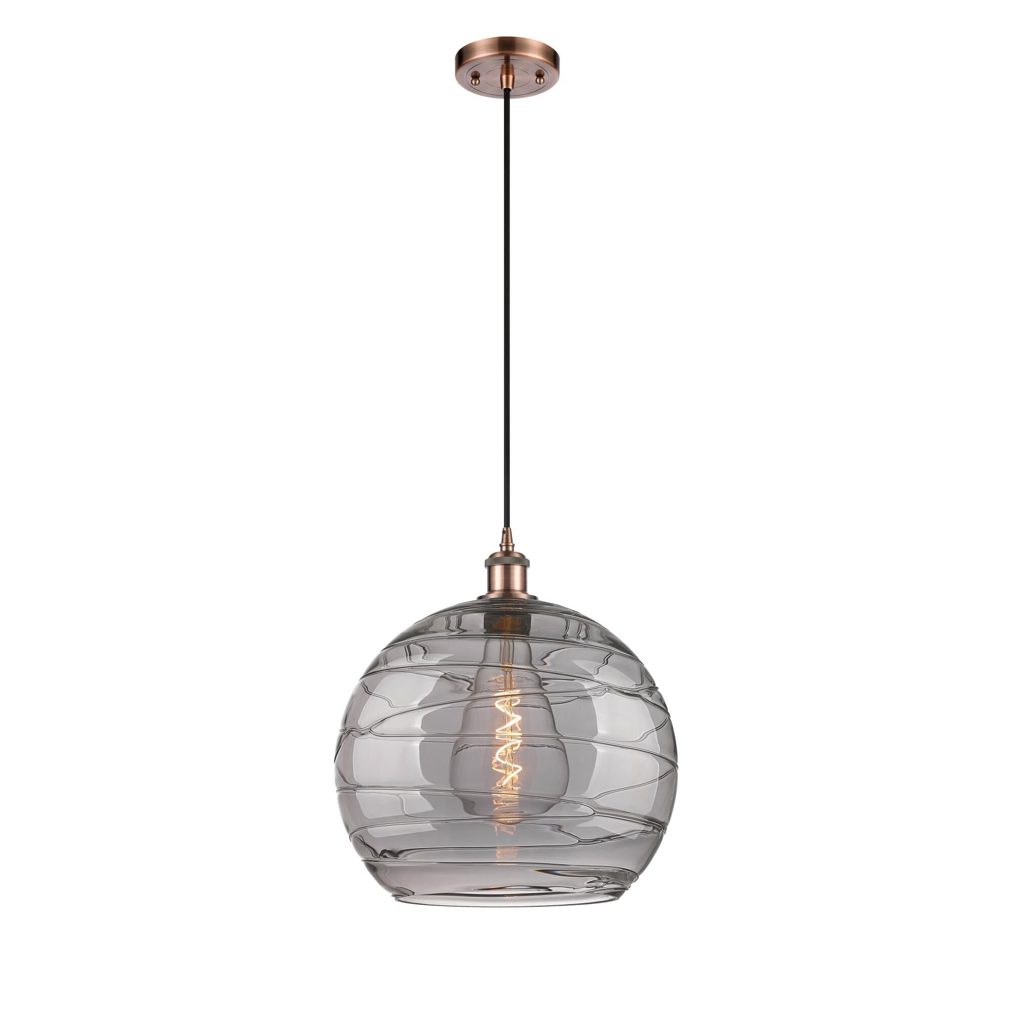 Shown in Antique Copper finish and Light Smoke Deco Swirl glass