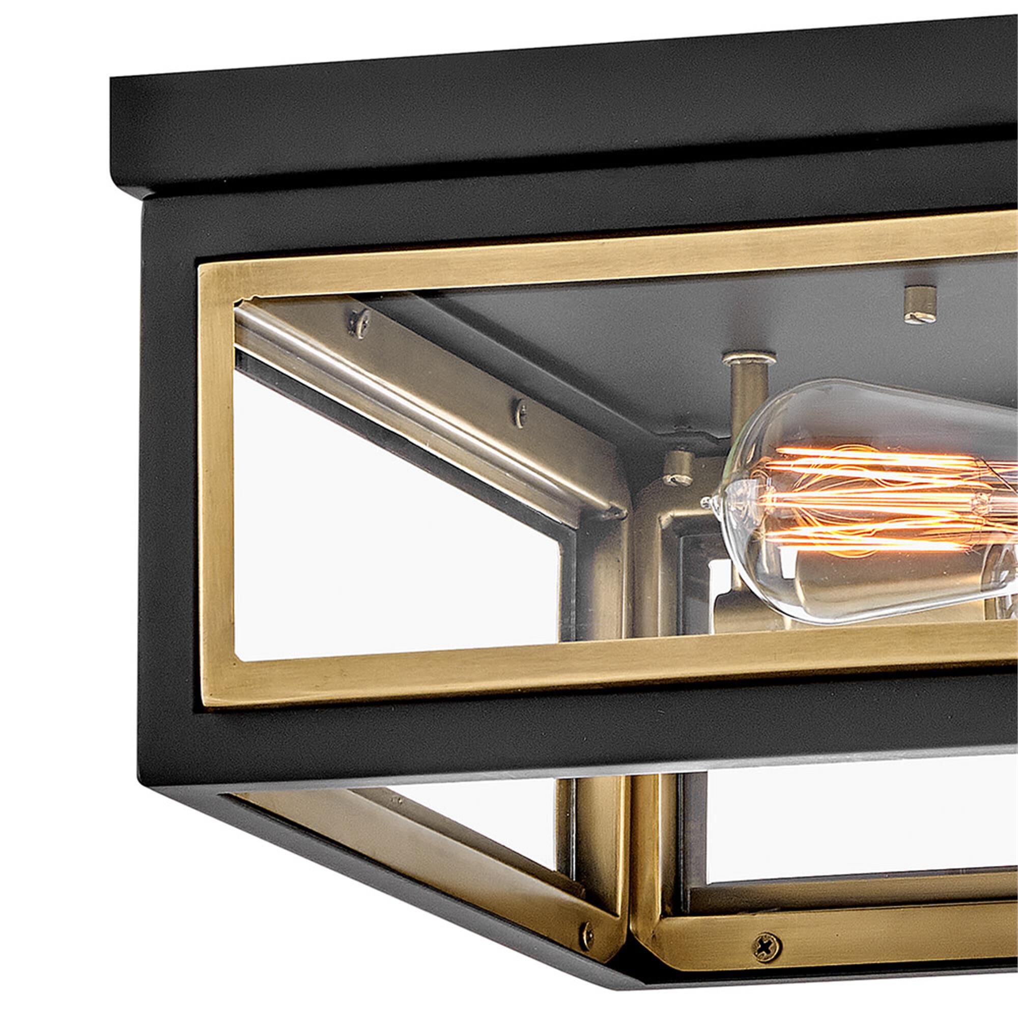 Shown in Black with Heritage Brass Accents finish and Clear glass