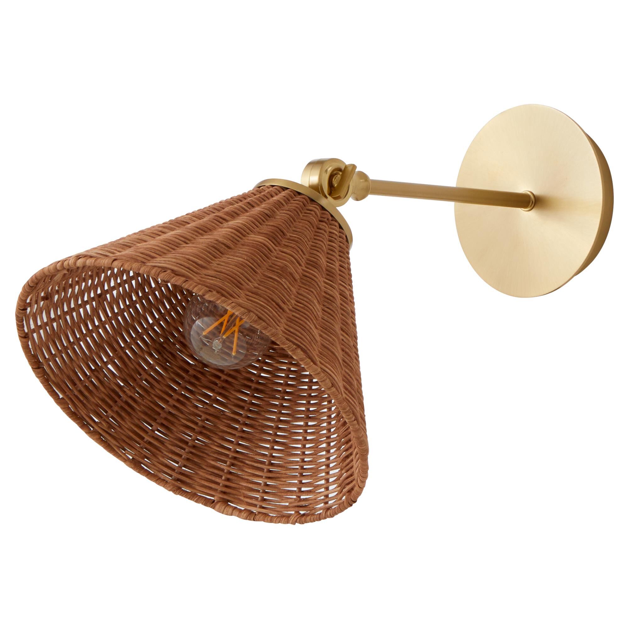 Shown in Aged Brass finish and Wicker shade