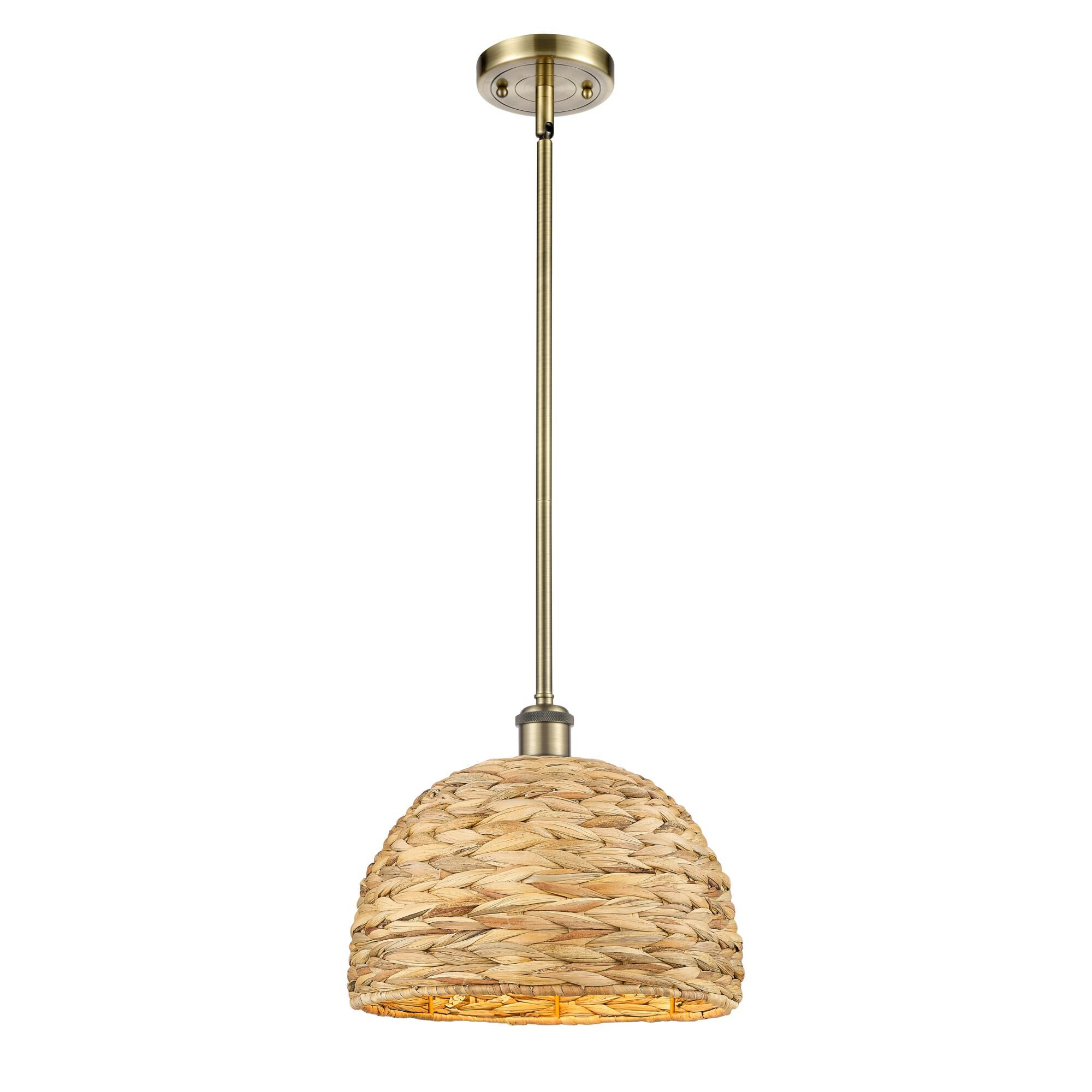 Shown in Antique Brass finish and Natural shade