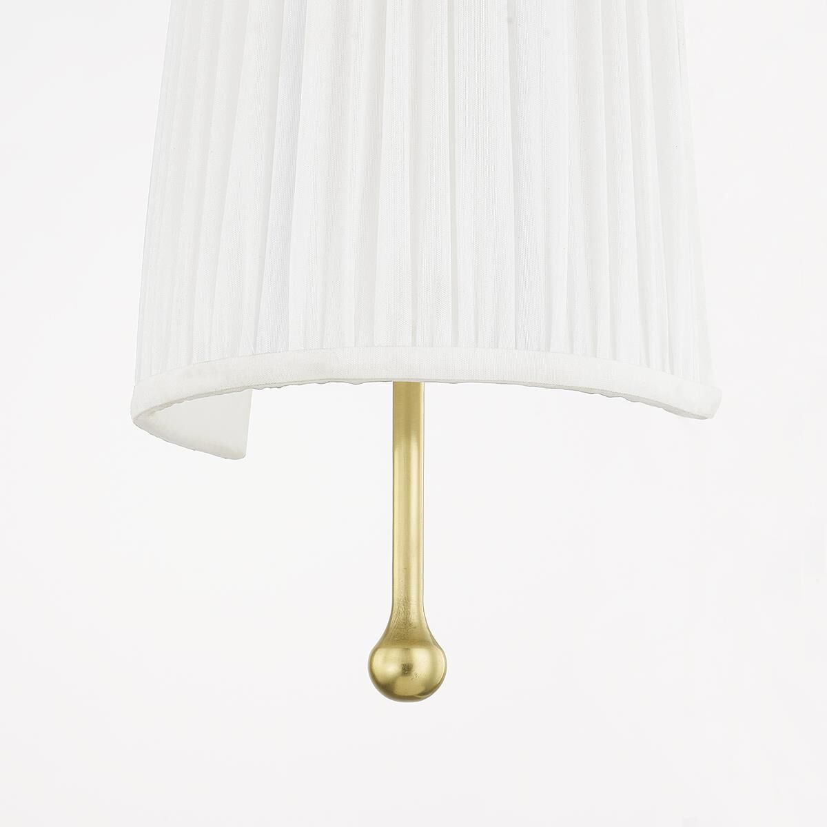 Shown in Aged Brass finish and Faux White Silk shade