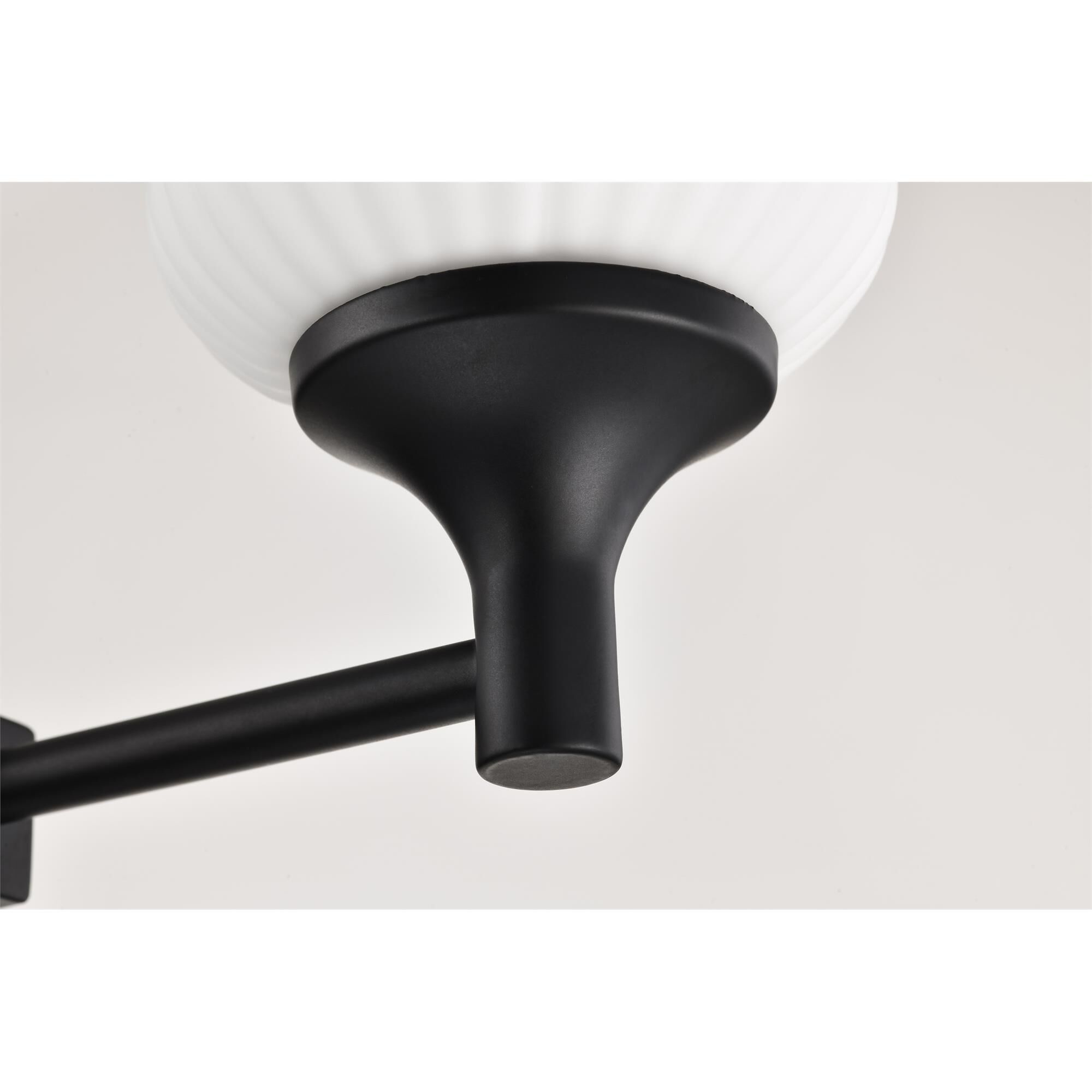 Shown in Matte Black finish and Frosted Ribbed glass