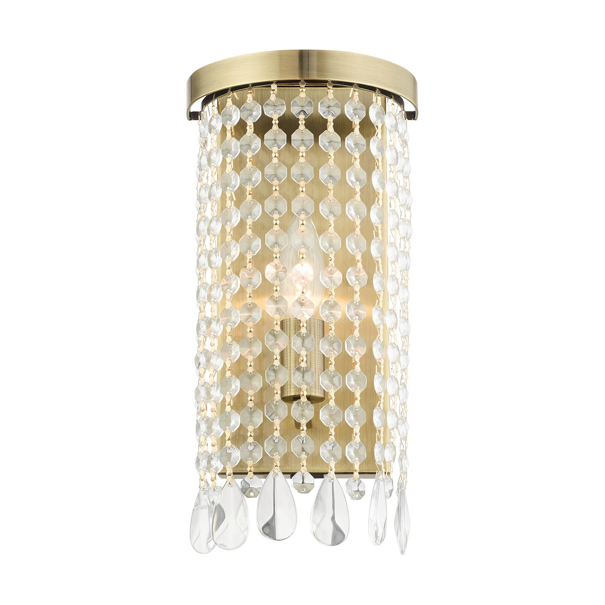 Shown in Antique Brass finish and Hand Assembled Crystal Shade glass