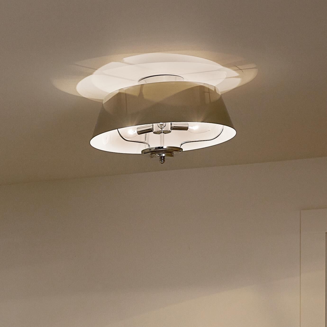 Shown in Polished Nickel finish and Metal shade