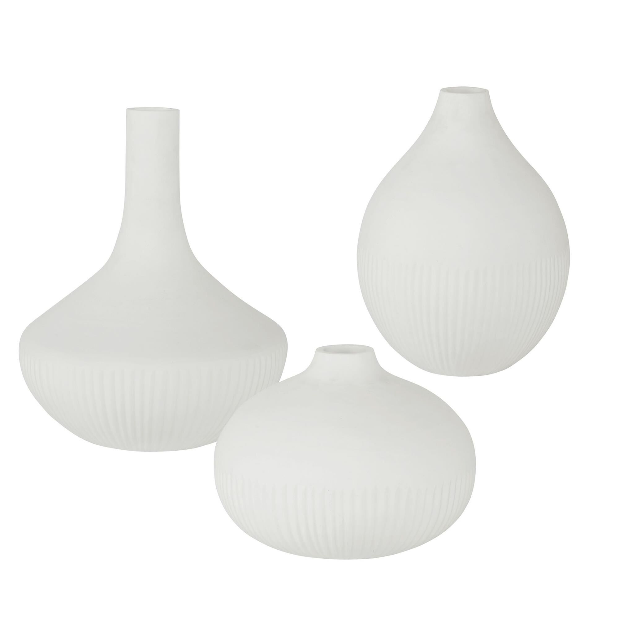 Shown in The Apothecary Vases Showcase Three Varying Curved Silhouettes Accented By Carved Details In A Satin finish