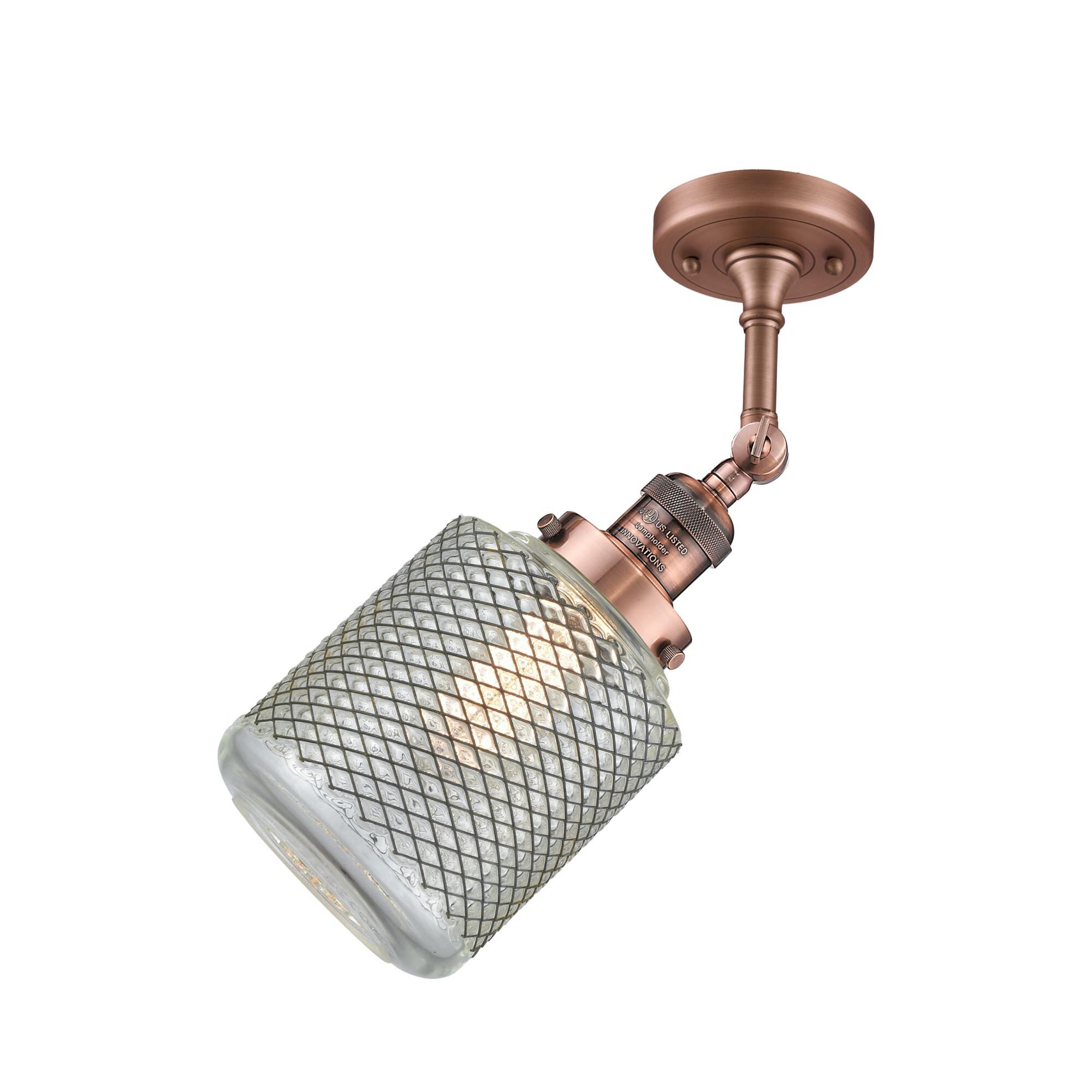 Shown in Antique Copper finish and Clear Wire Mesh glass