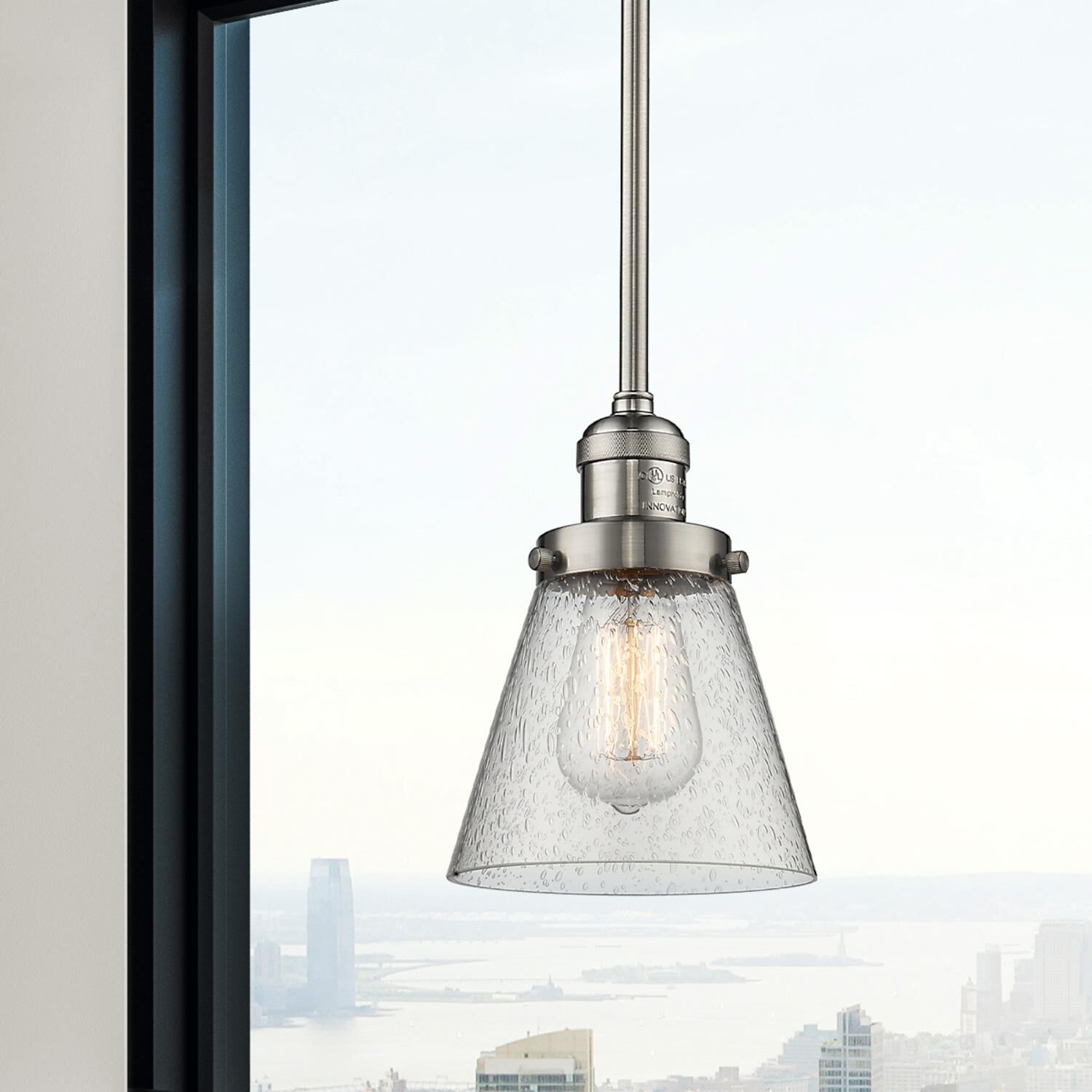 Shown in Brushed Satin Nickel finish and Seedy glass