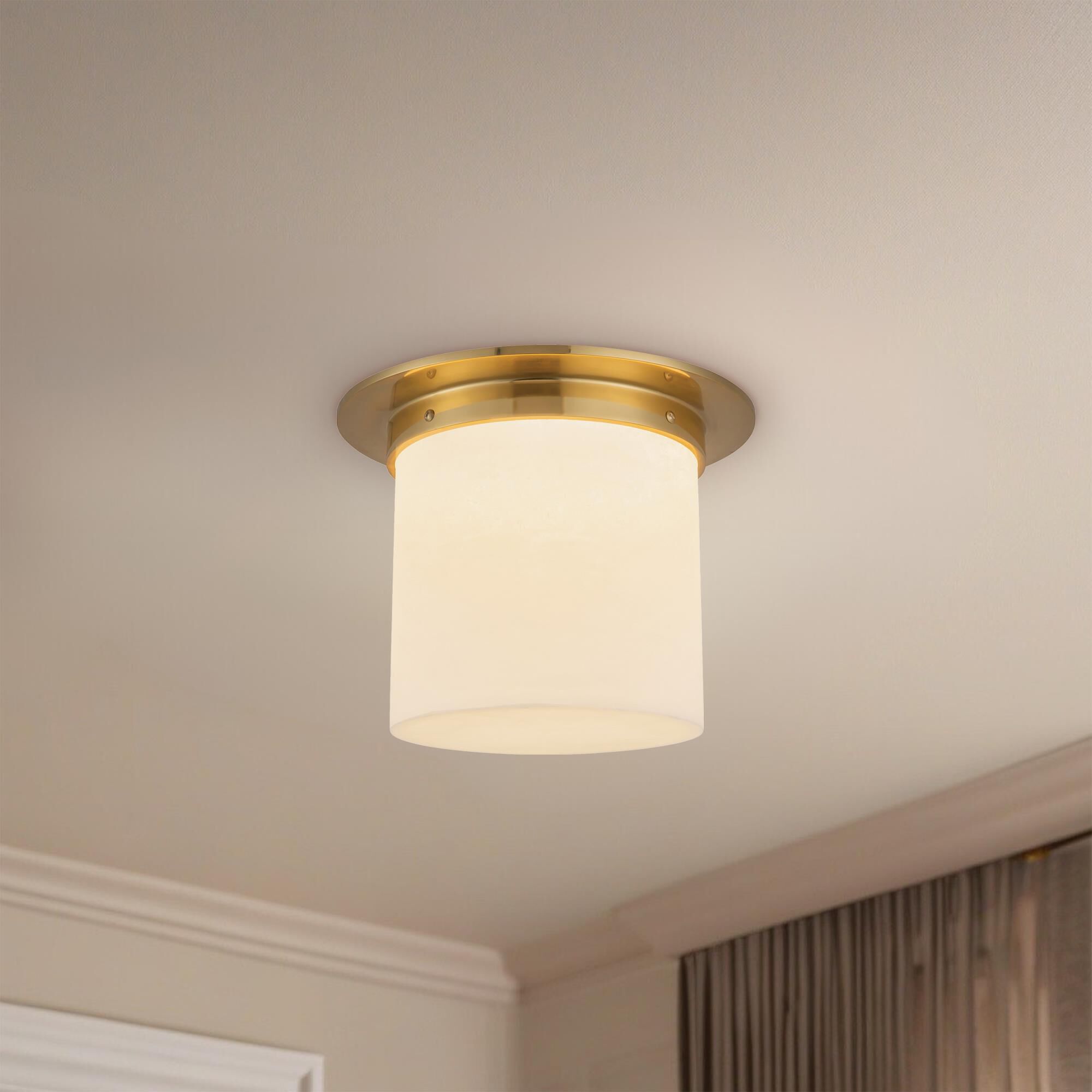 Shown in Patina Brass finish and Alabaster glass