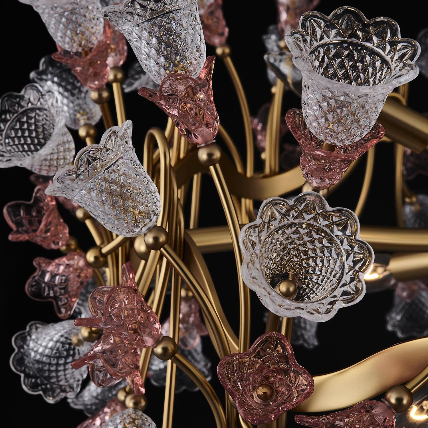 Shown in Antique Brass finish and Vintage Rose crystal