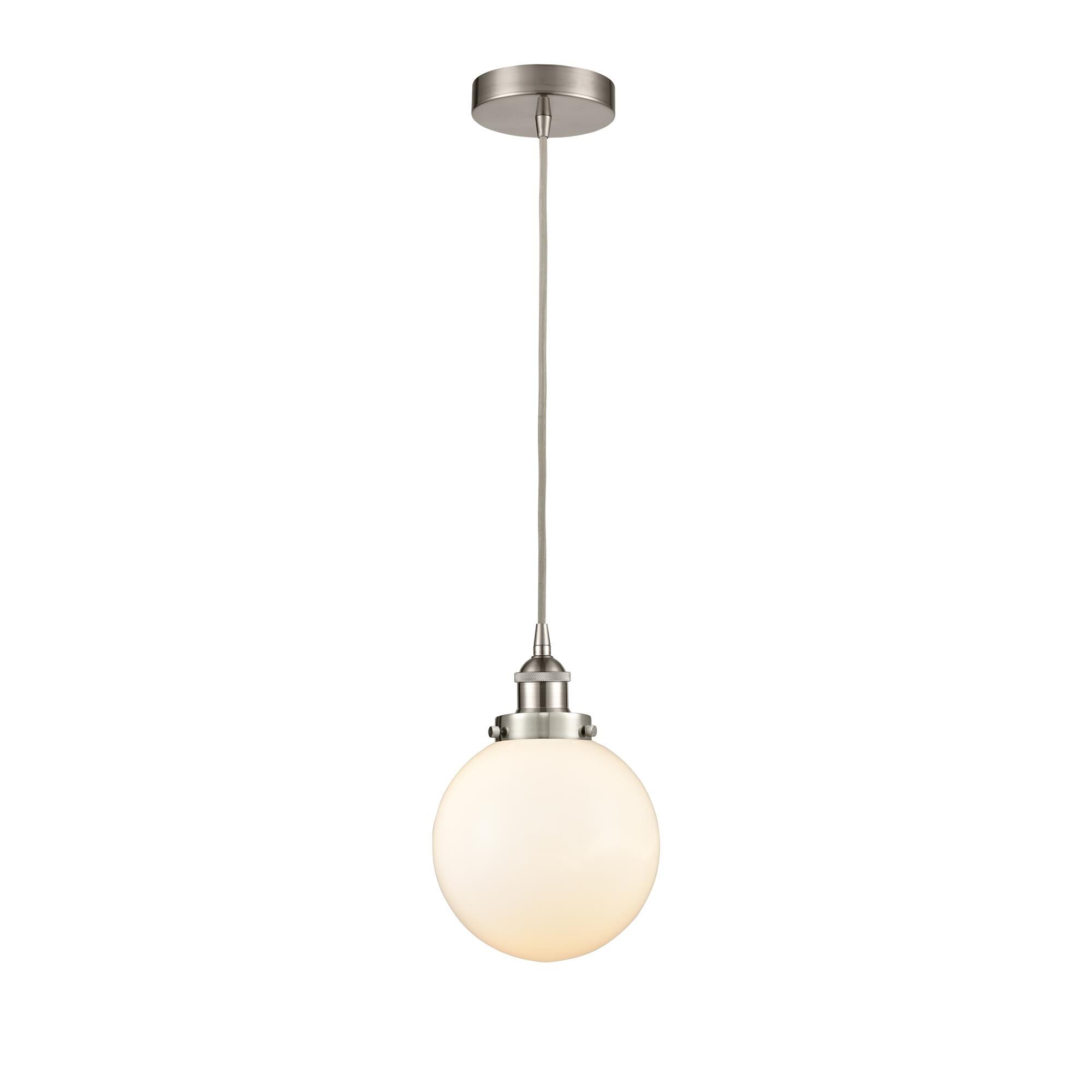 Shown in Brushed Satin Nickel finish and Matte White Cased Beacon glass
