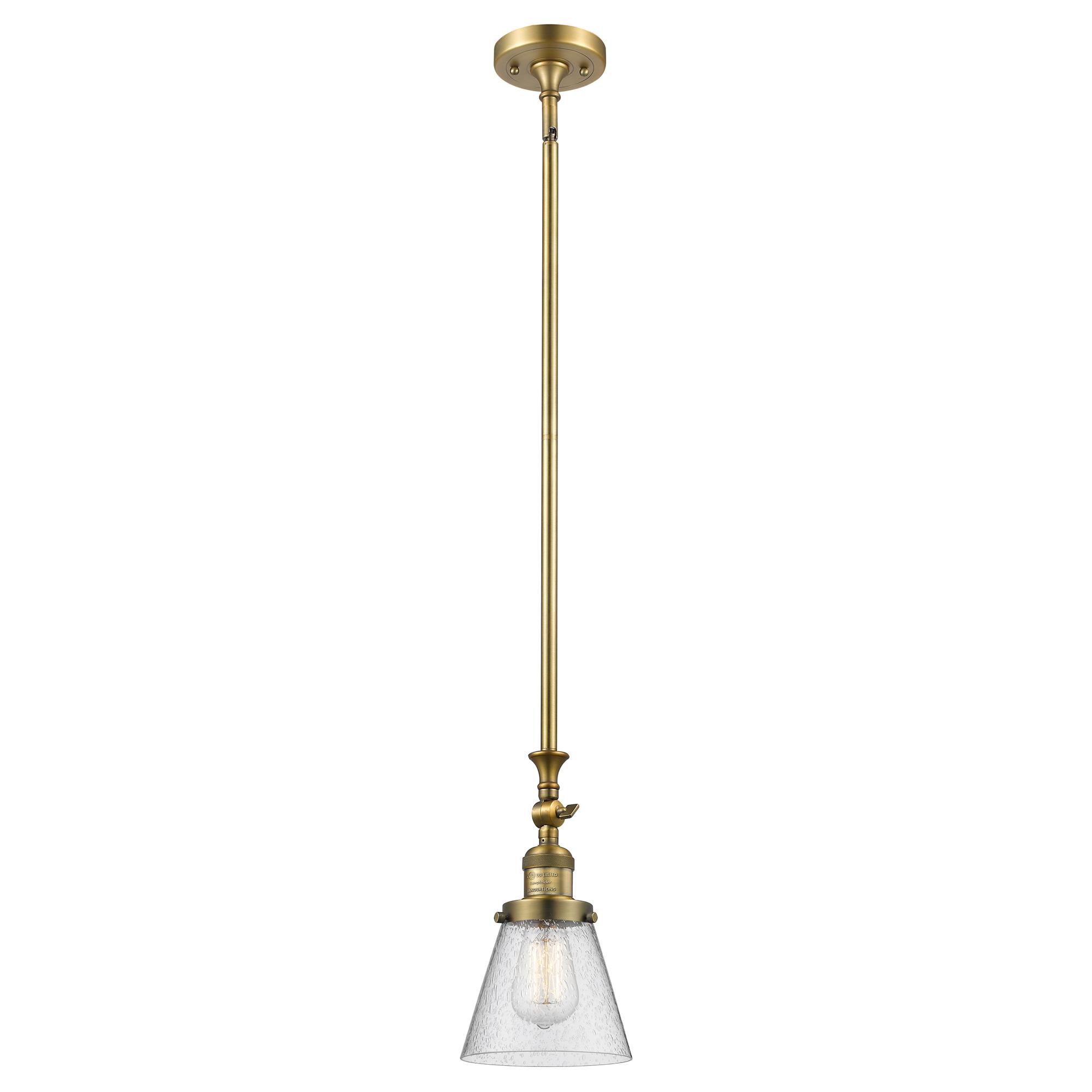 Shown in Brushed Brass finish and Seedy glass