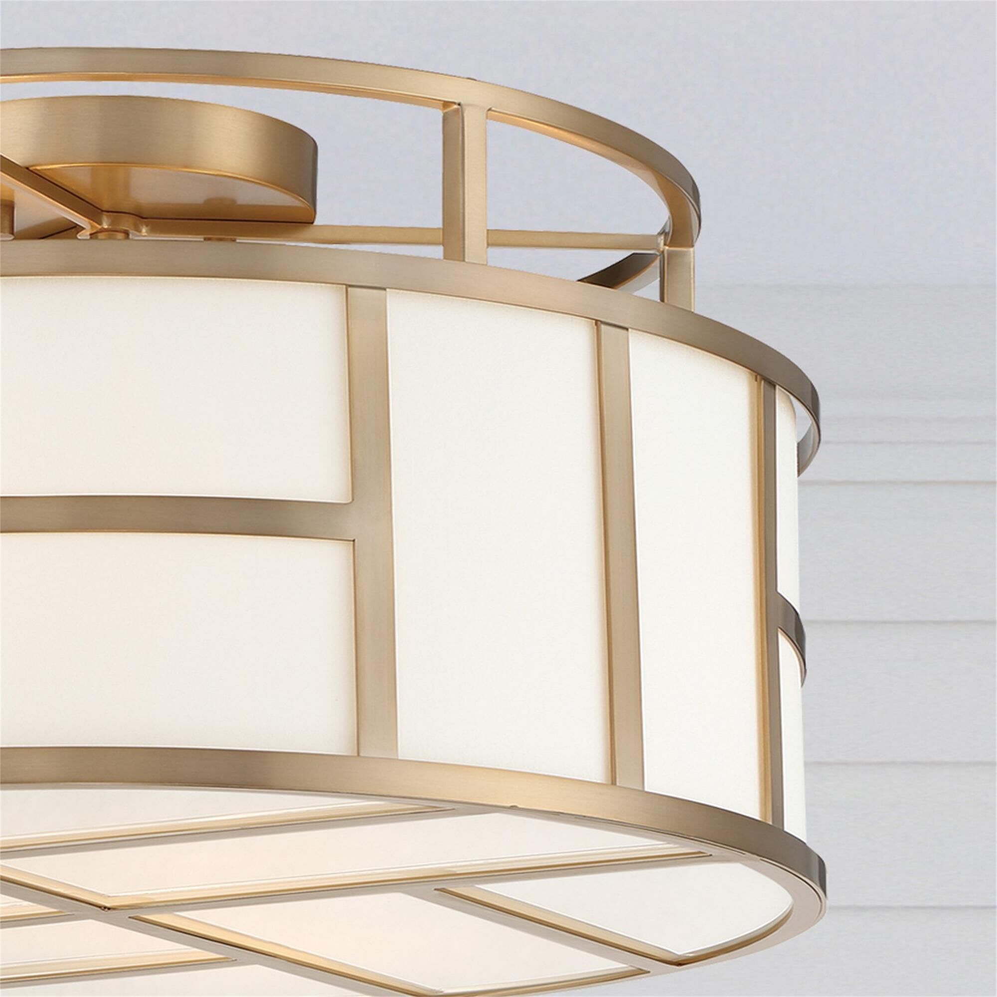 Shown in Vibrant Gold finish and Silk glass and White shade