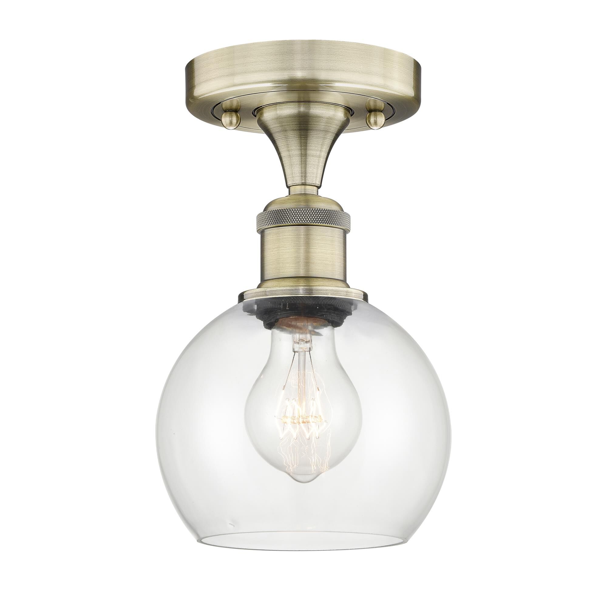 Shown in Antique Brass finish and Clear glass
