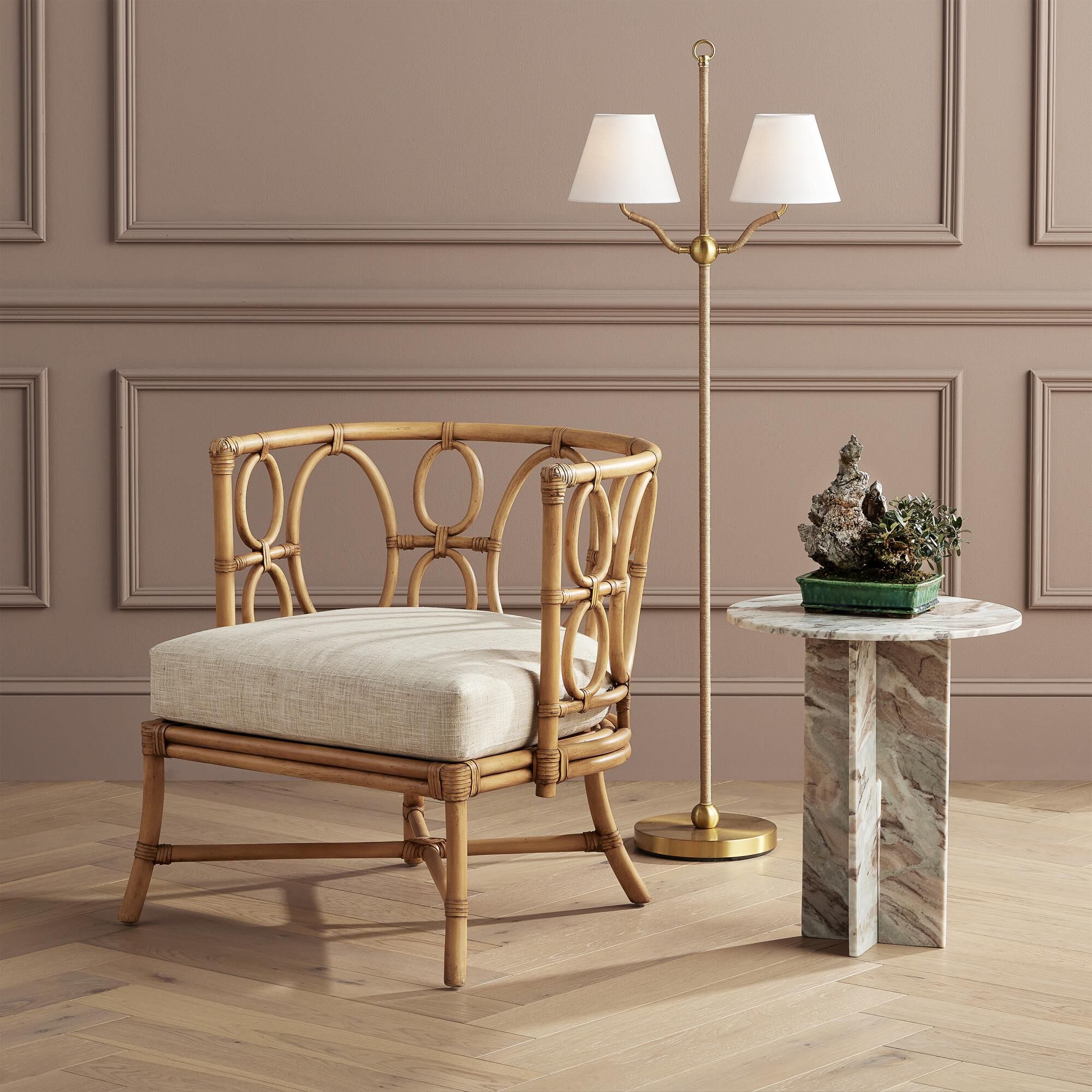 Shown in Antique Brass finish and Off-White Linen shade