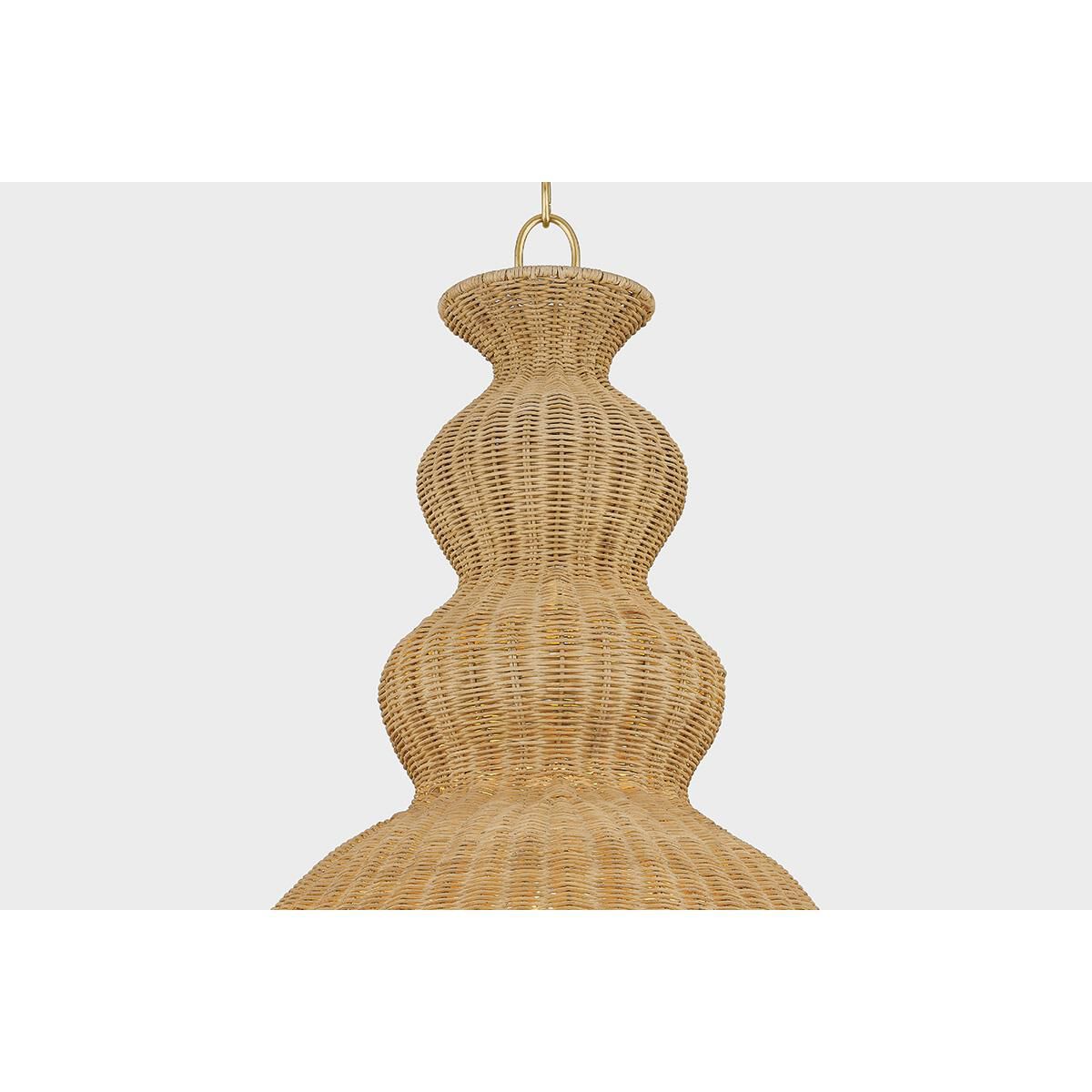Shown in Aged Brass finish and Light Natural Wicker shade