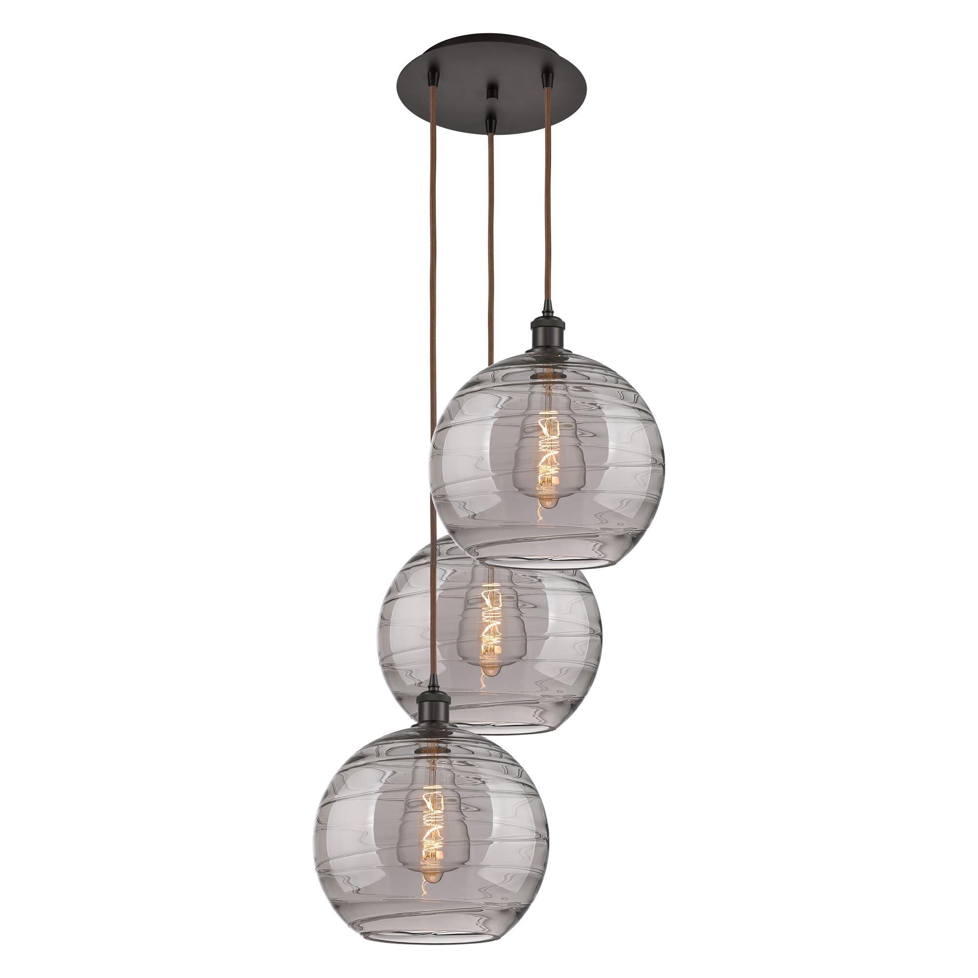 Shown in Oil Rubbed Bronze finish and Light Smoke Deco Swirl glass