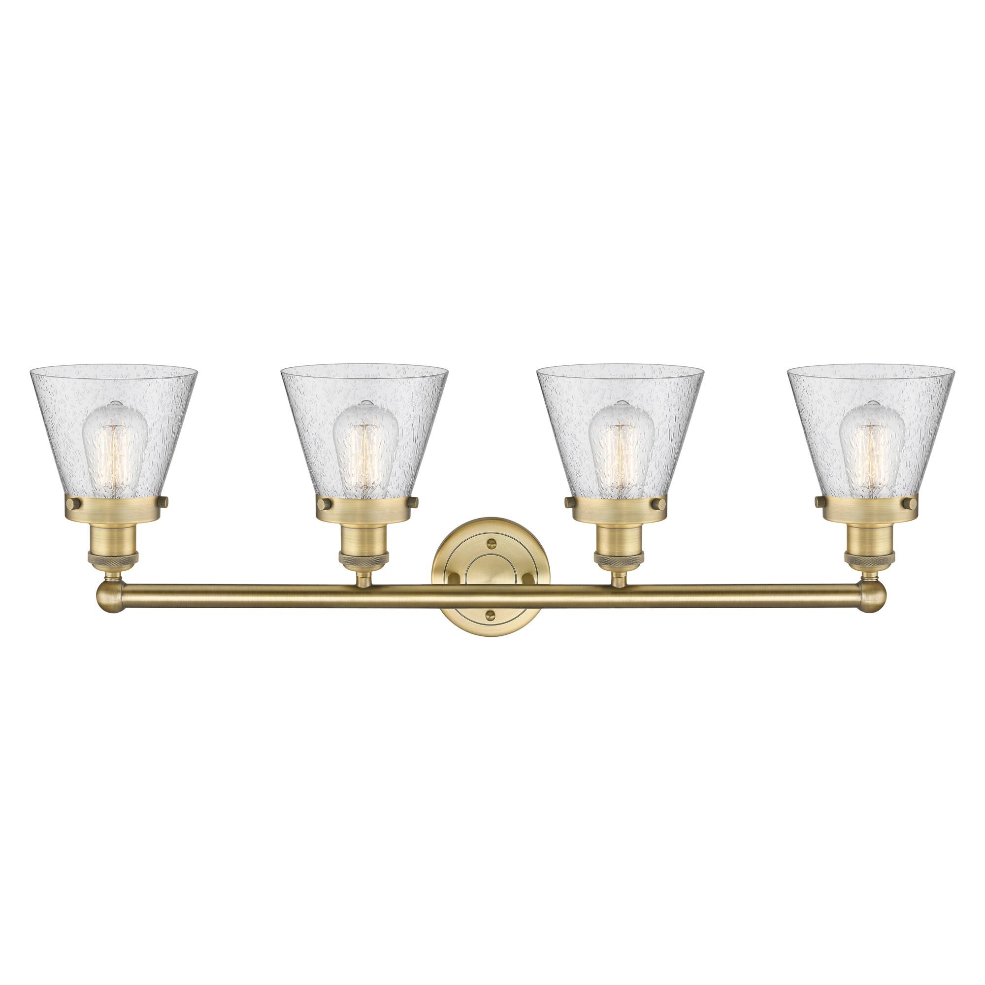 Shown in Brushed Brass finish and Seedy glass