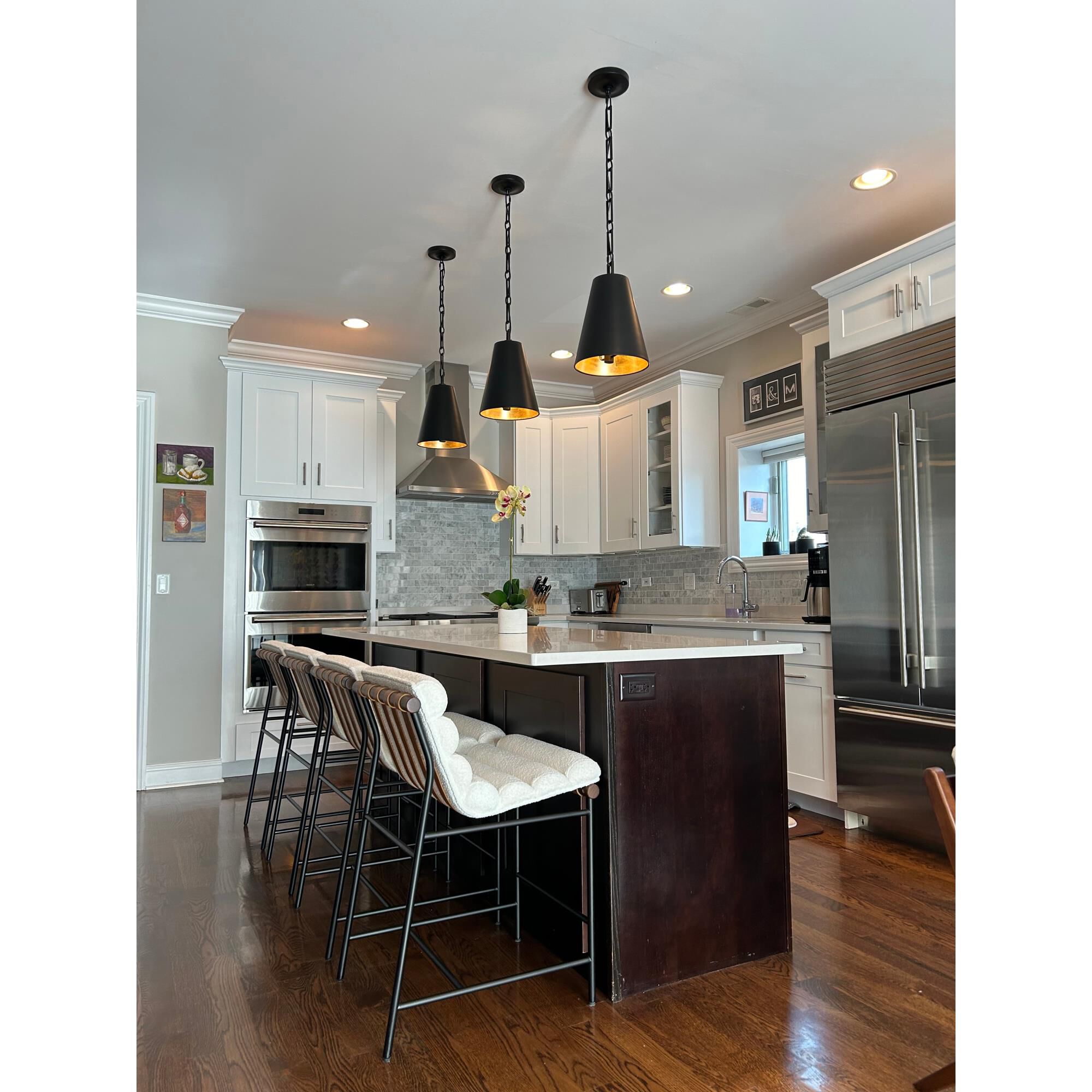 Shown in Matte Black + Antique Gold finish and Iron glass and Black shade