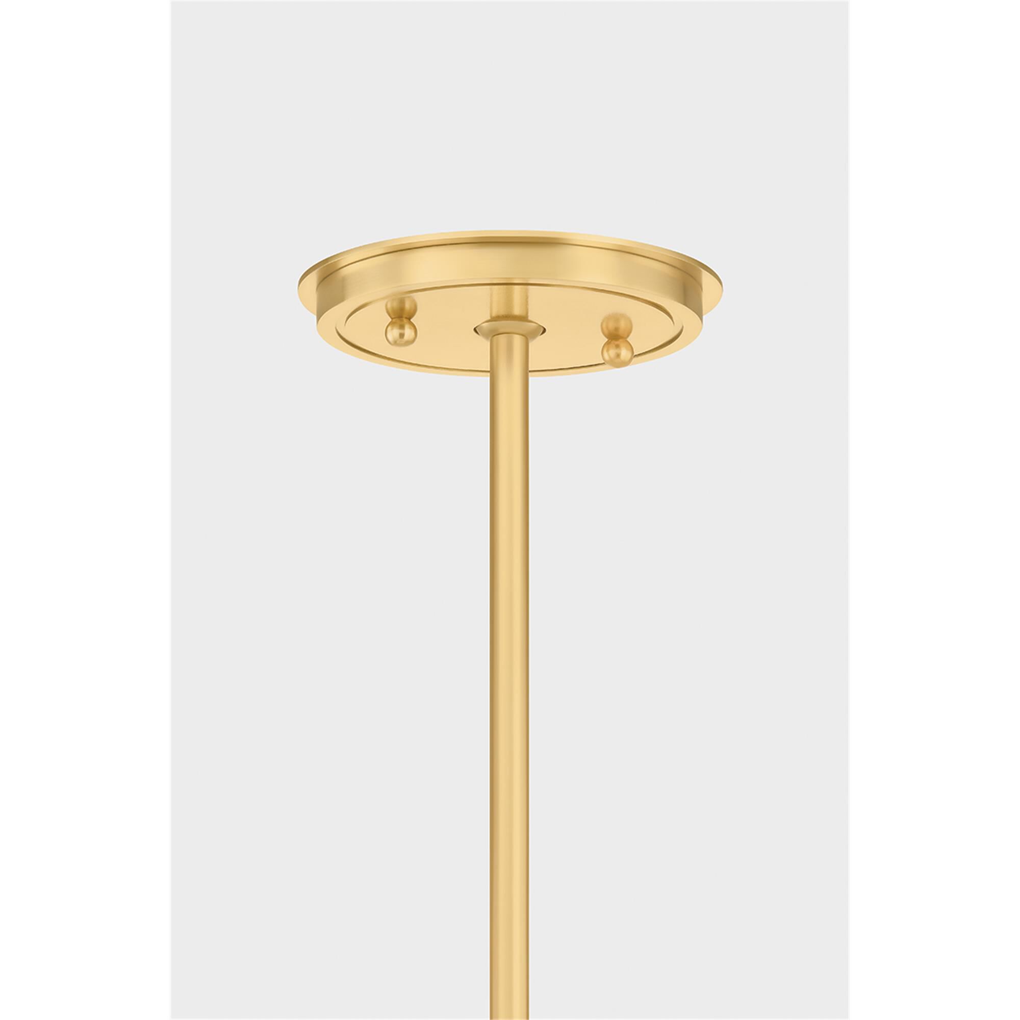 Shown in Aged Brass finish and Ivory Linen shade