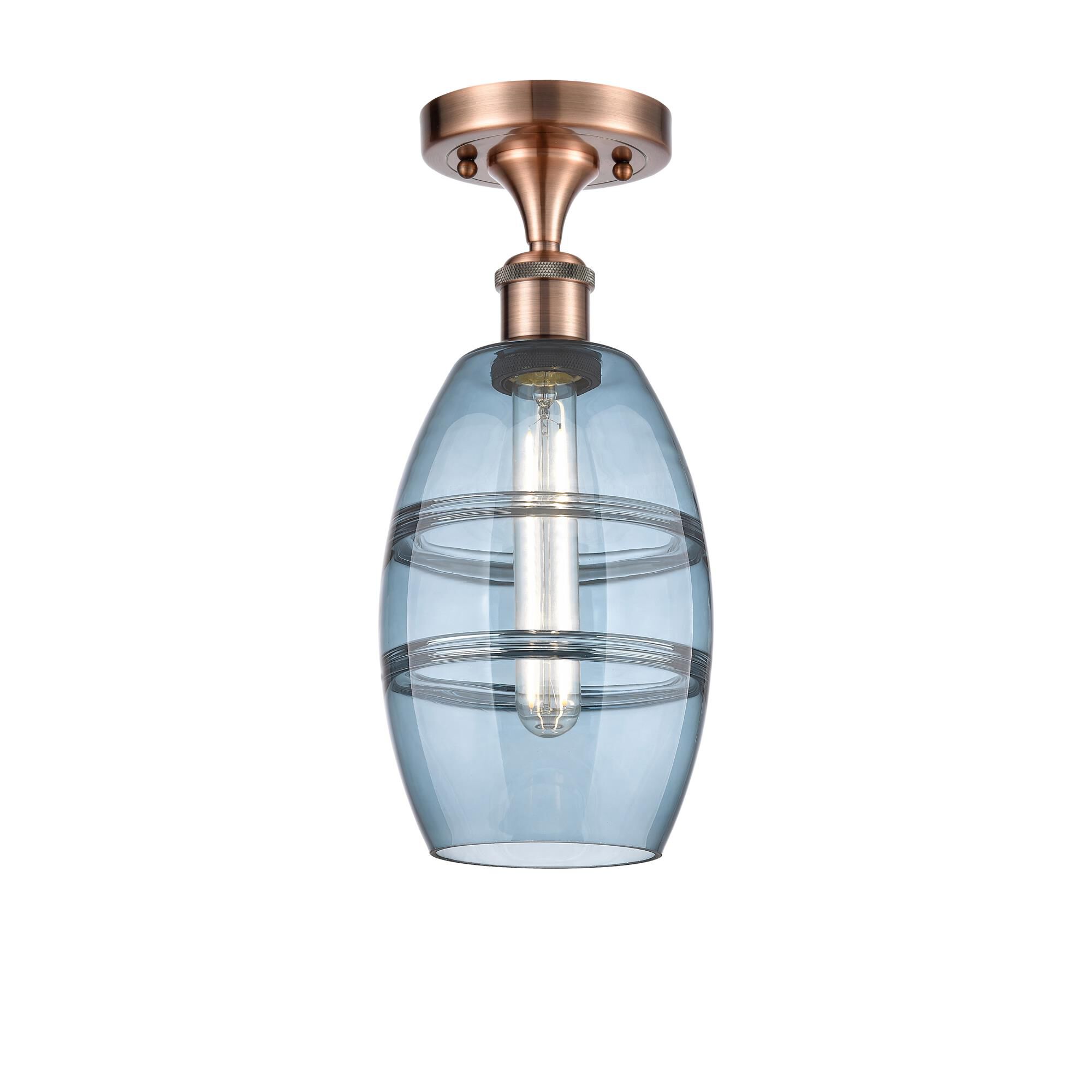 Shown in Antique Copper finish and Princess Blue glass