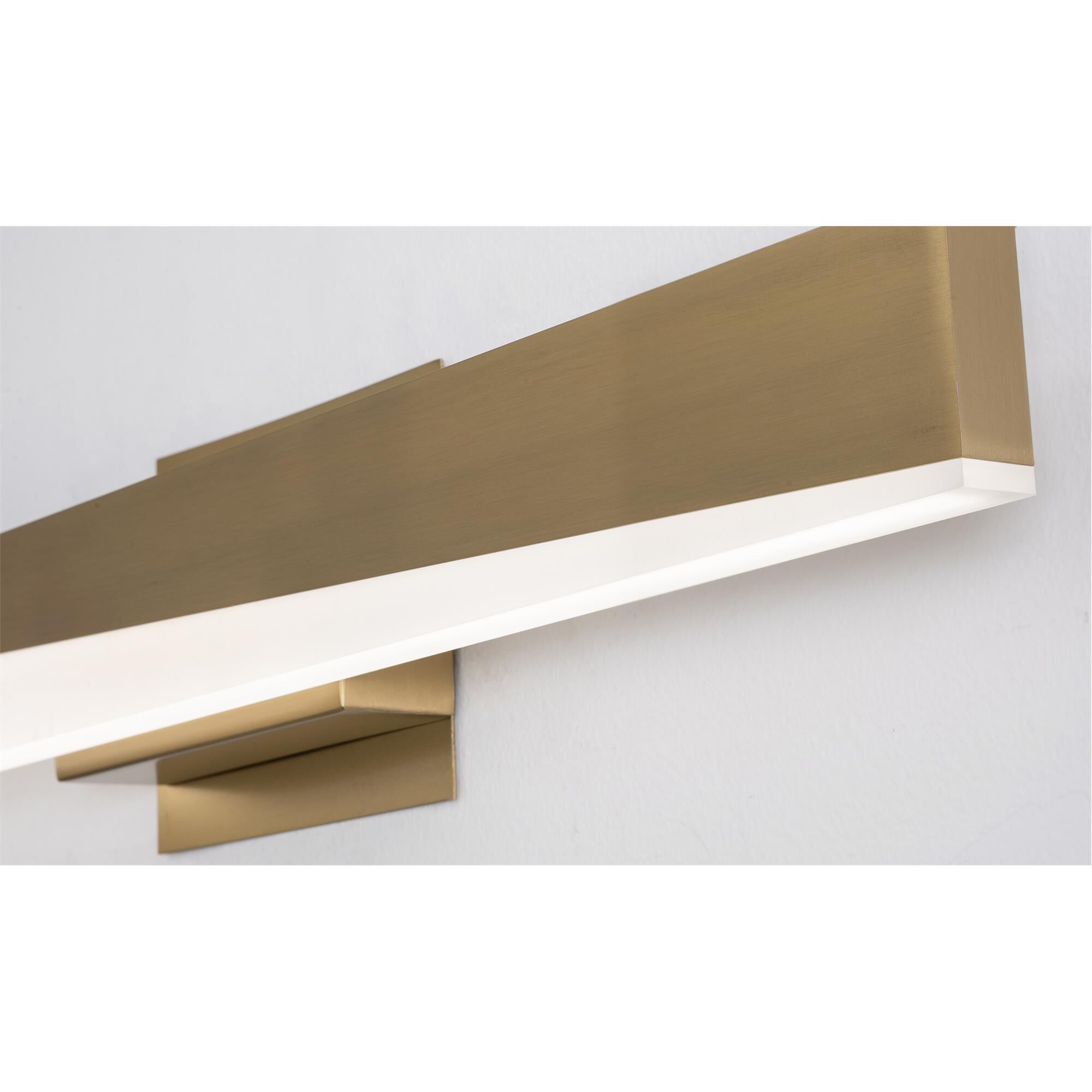 Shown in Light Antique Brass finish and Frosted glass
