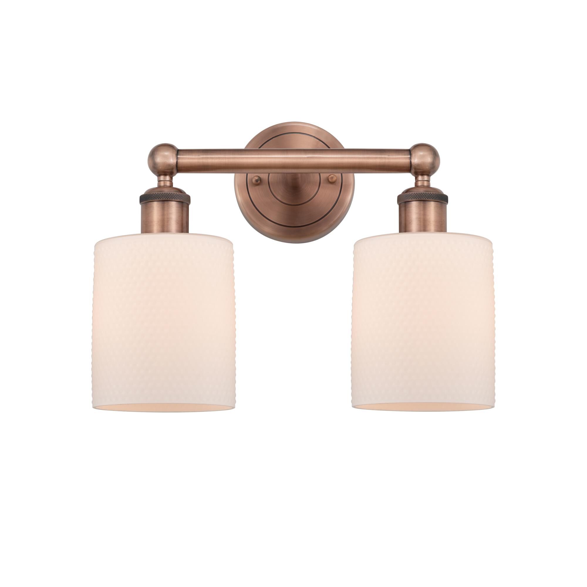 Shown in Antique Copper finish and Matte White glass