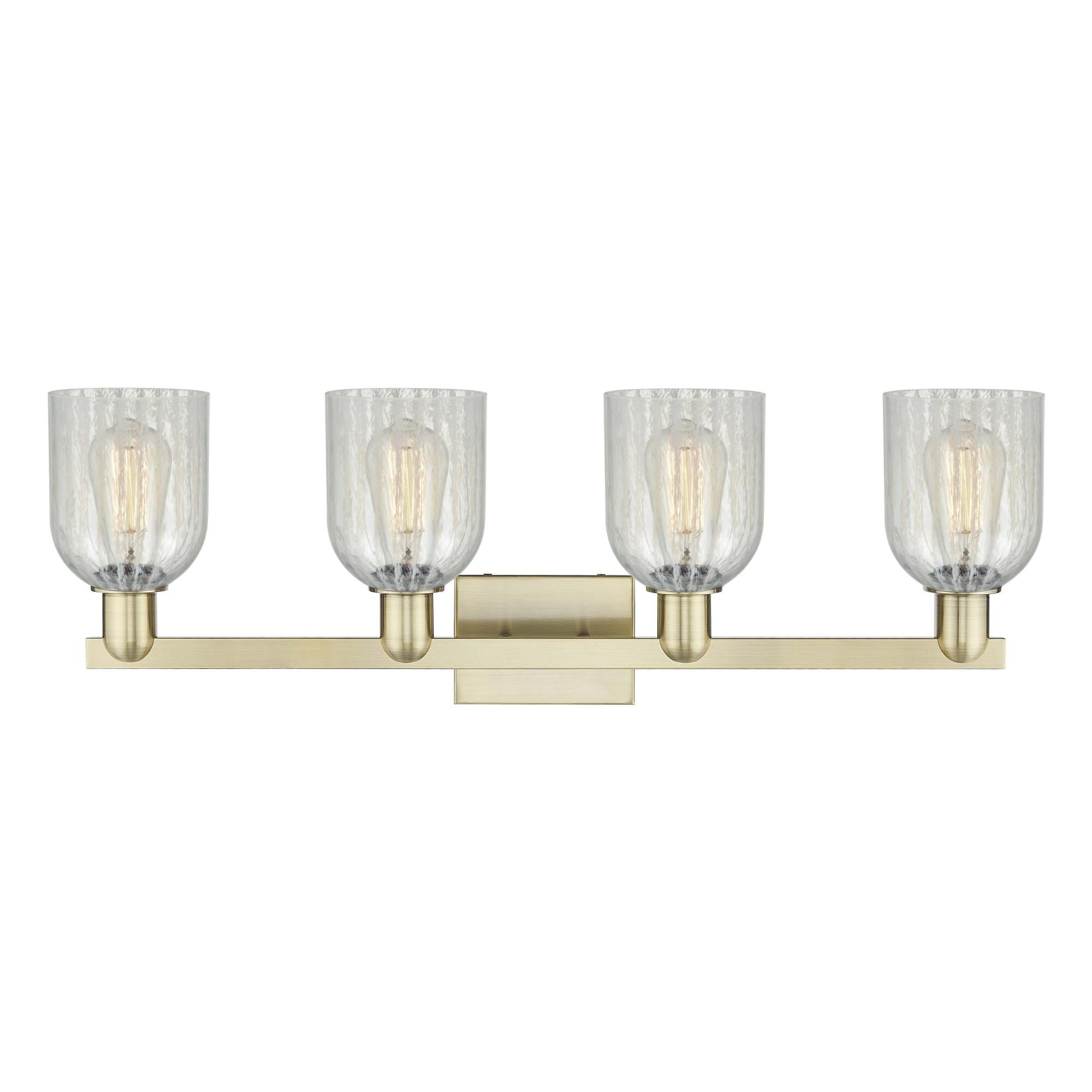 Shown in Antique Brass finish and Mouchette glass