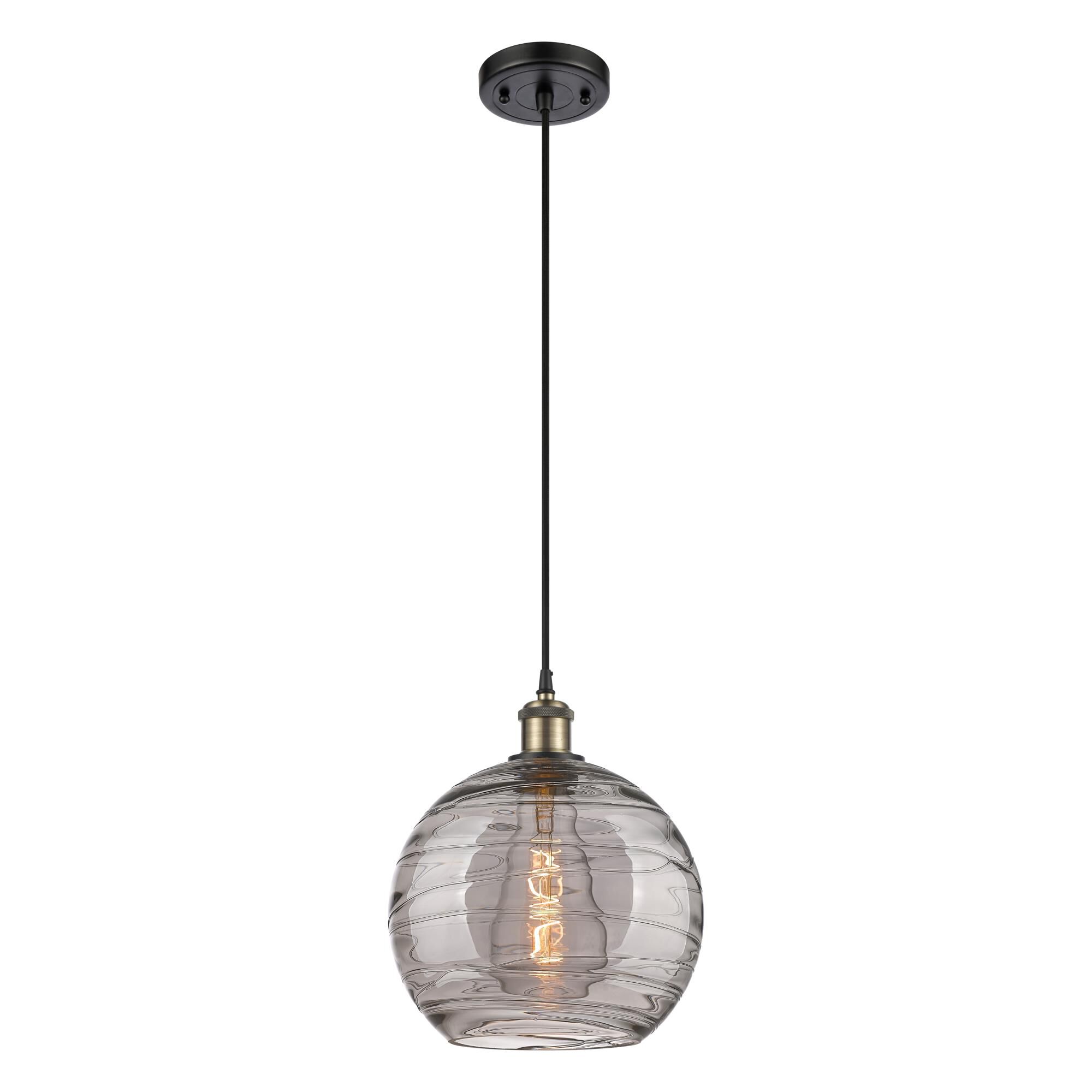 Shown in Black Antique Brass finish and Light Smoke Deco Swirl glass