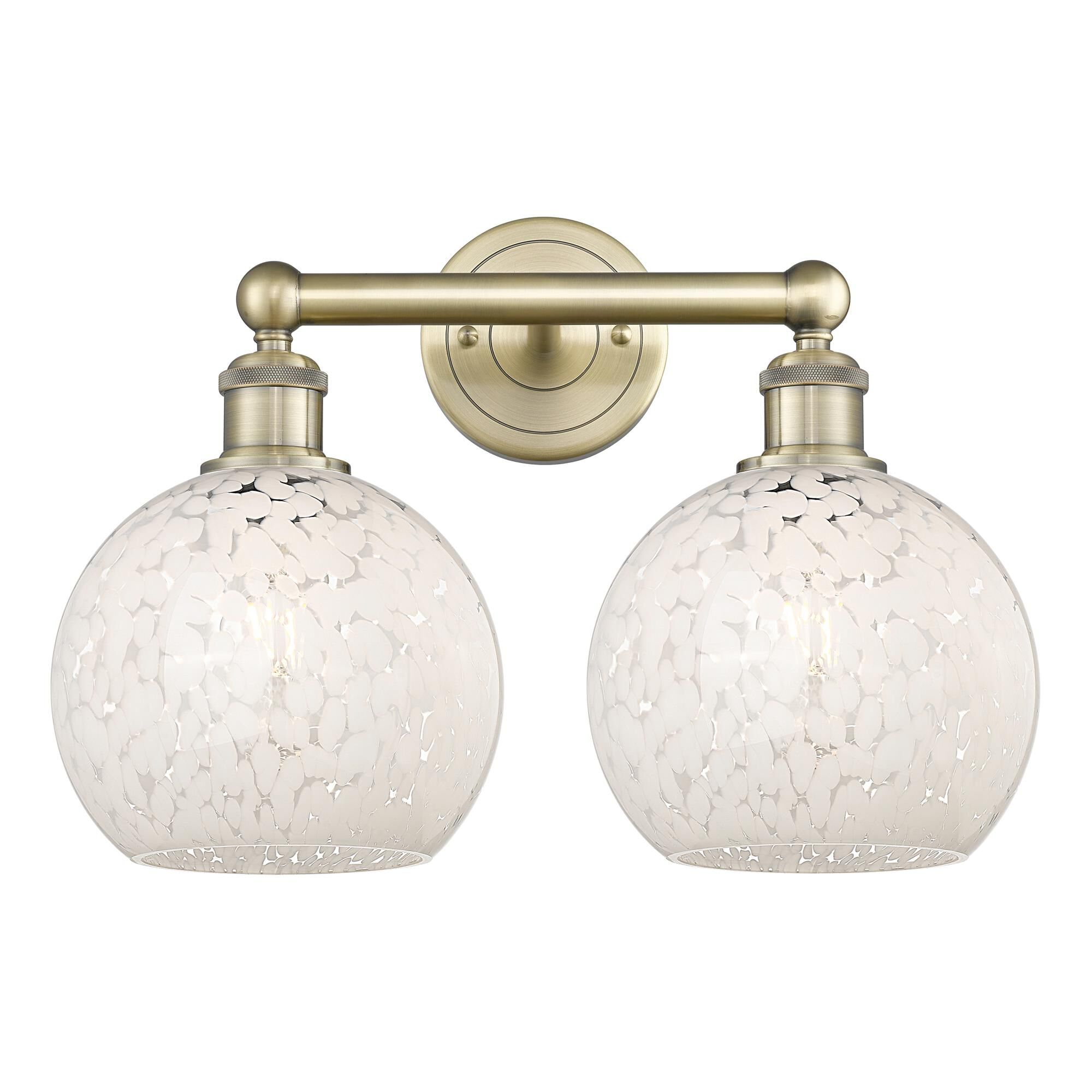 Shown in Antique Brass finish and White Mouchette glass