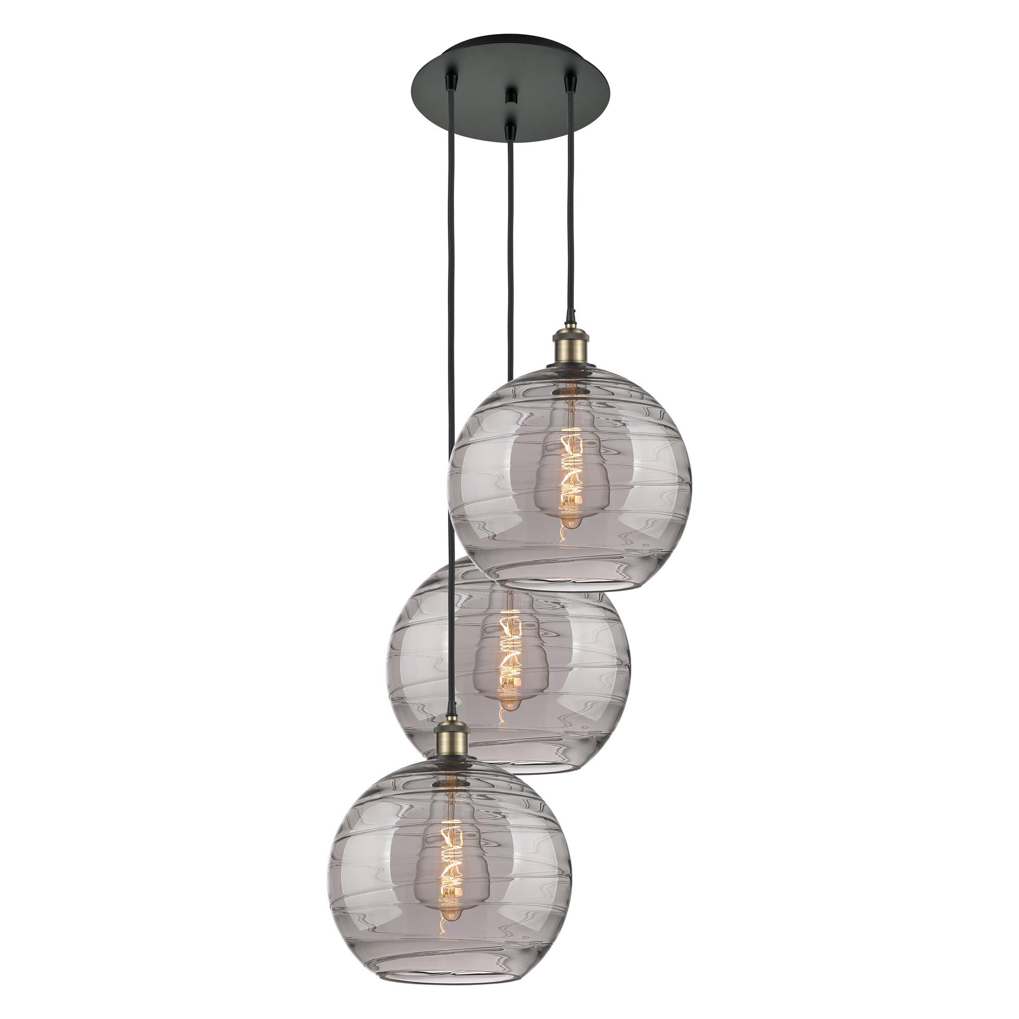 Shown in Black Antique Brass finish and Light Smoke Deco Swirl glass