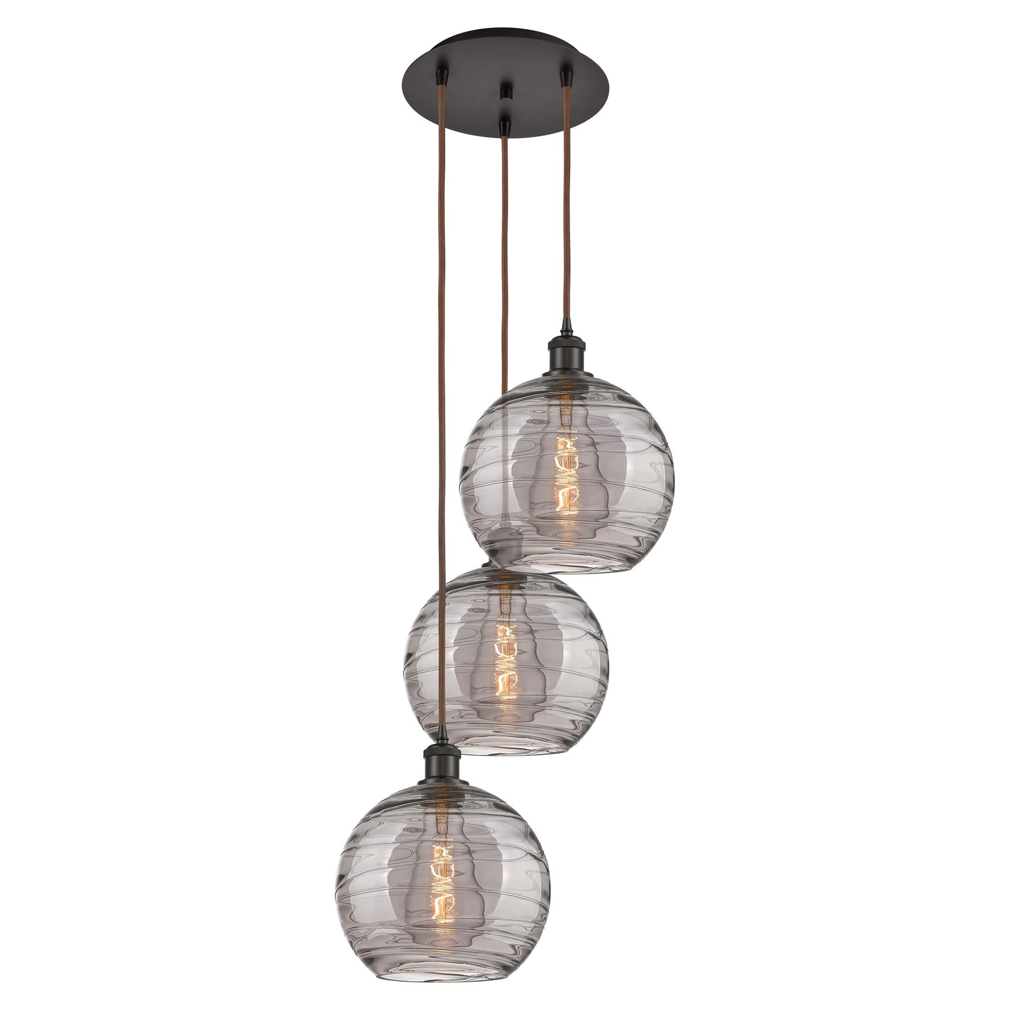 Shown in Oil Rubbed Bronze finish and Light Smoke Deco Swirl glass
