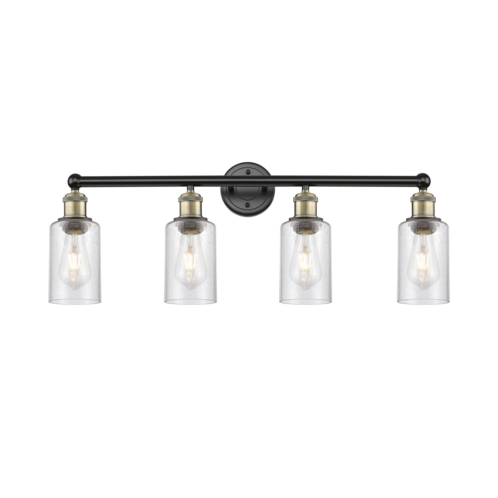 Shown in Black Antique Brass finish and Seedy glass