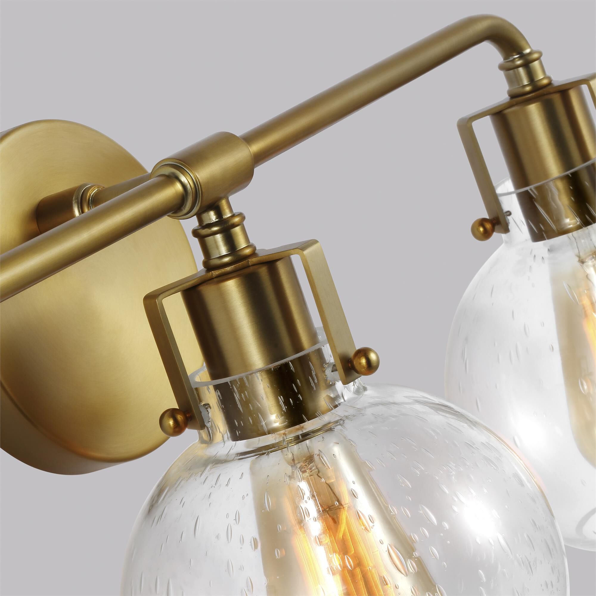 Shown in Burnished Brass finish and Clear Seeded glass