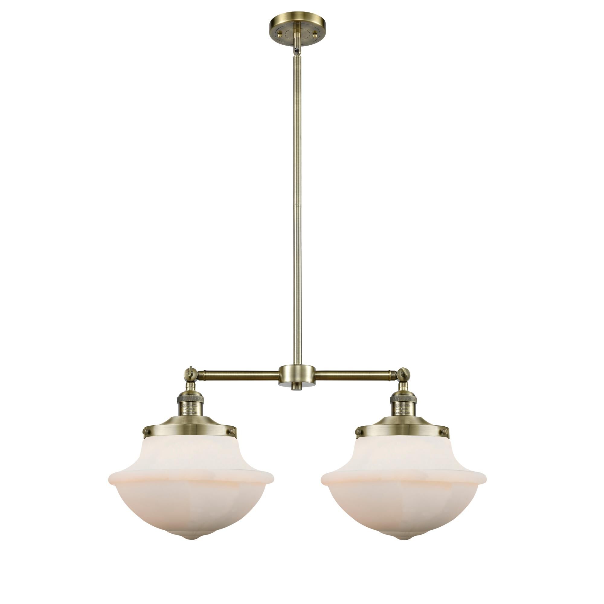 Shown in Antique Brass finish and Schoolhouse glass and Glass shade