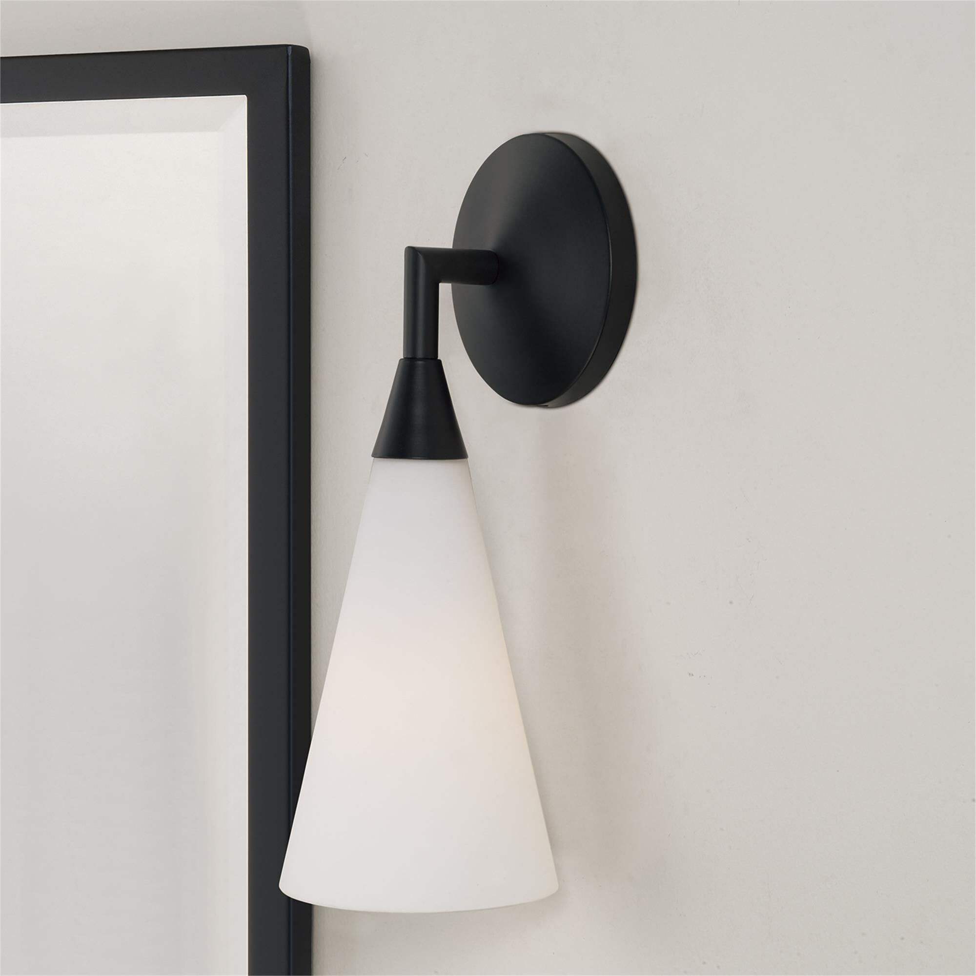 Shown in Matte Black finish and Soft White glass