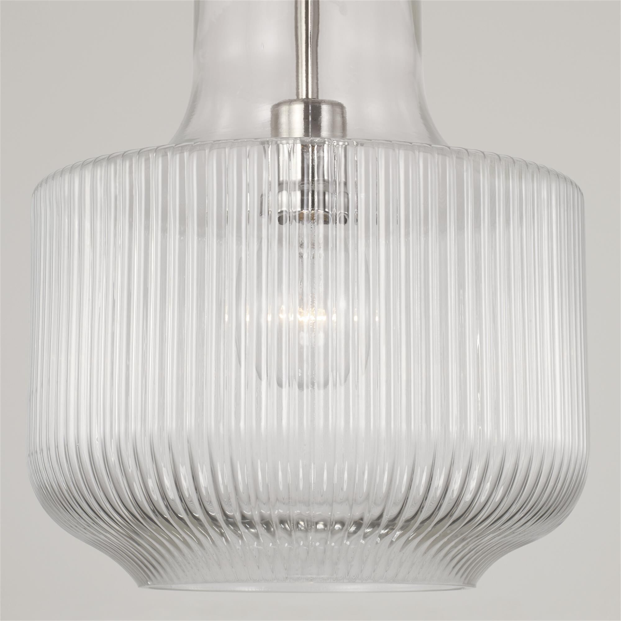 Shown in Polished Nickel finish and Clear Fluted glass