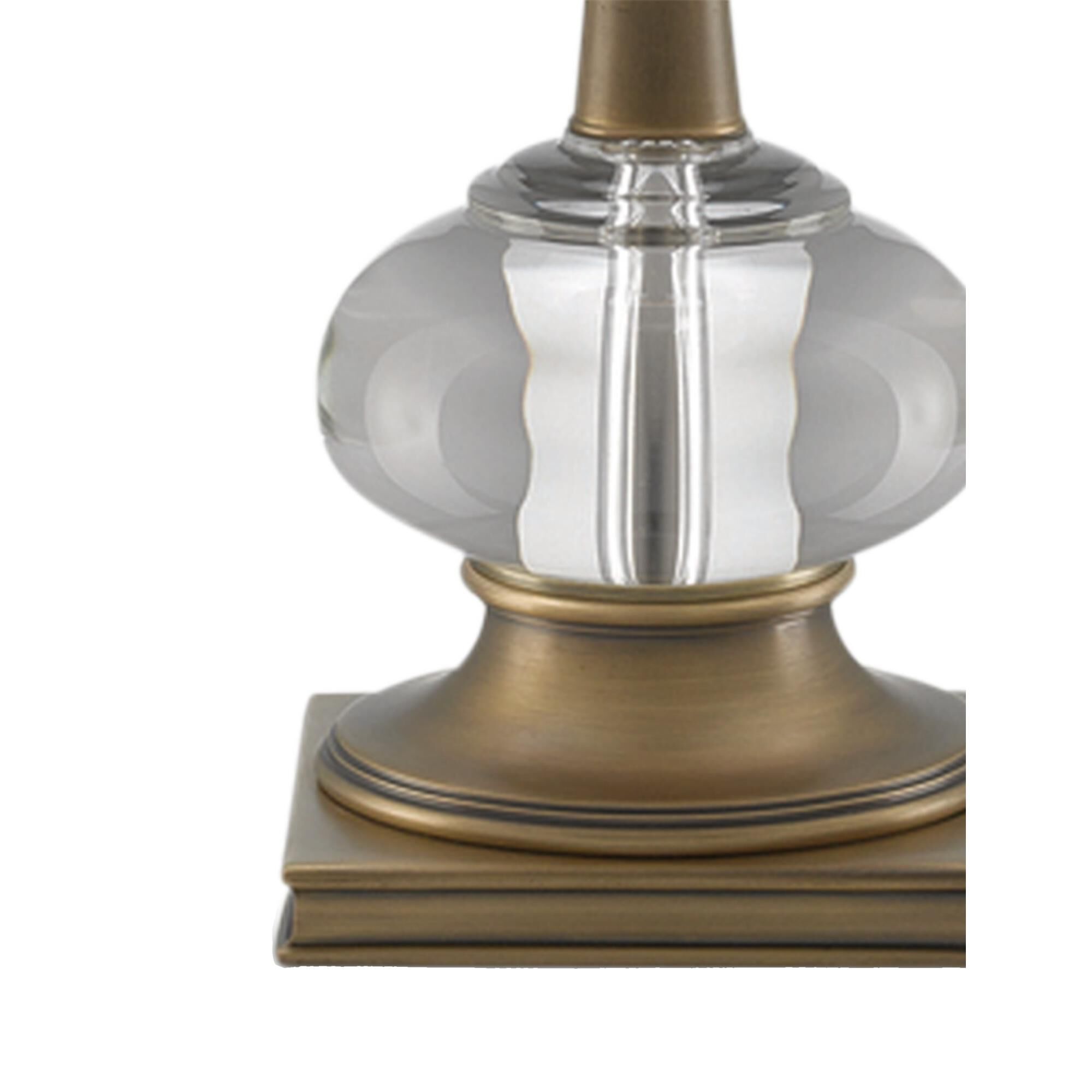 Shown in Antique Brass/Clear finish and Included shade