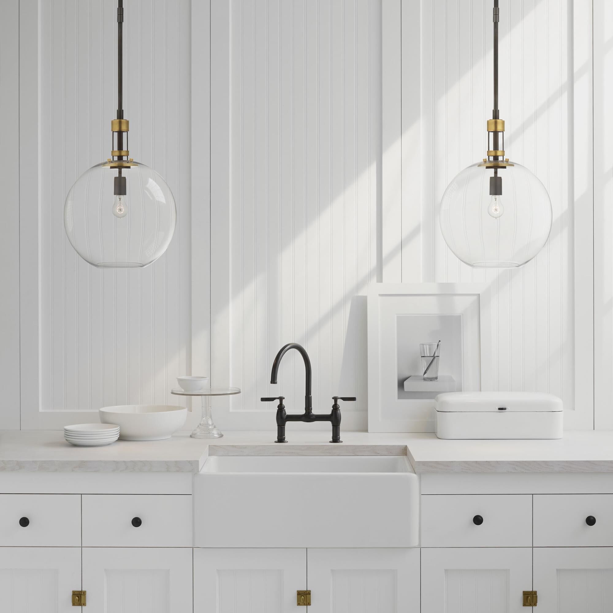 Shown in Bronze With Antique Brass finish and Clear glass